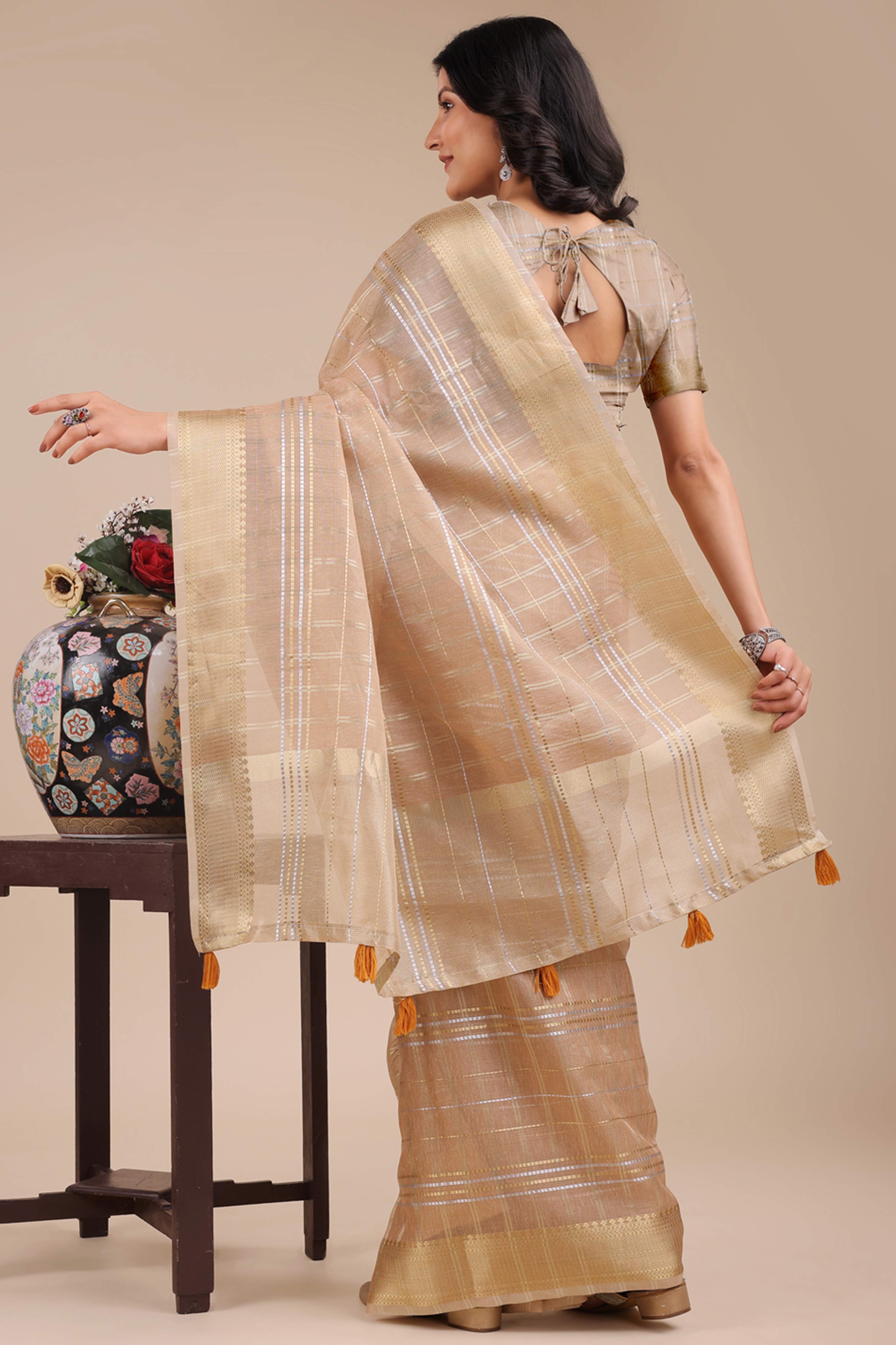 Beige Organza Saree with Checkered Zari Weaving and Tassel Elegance