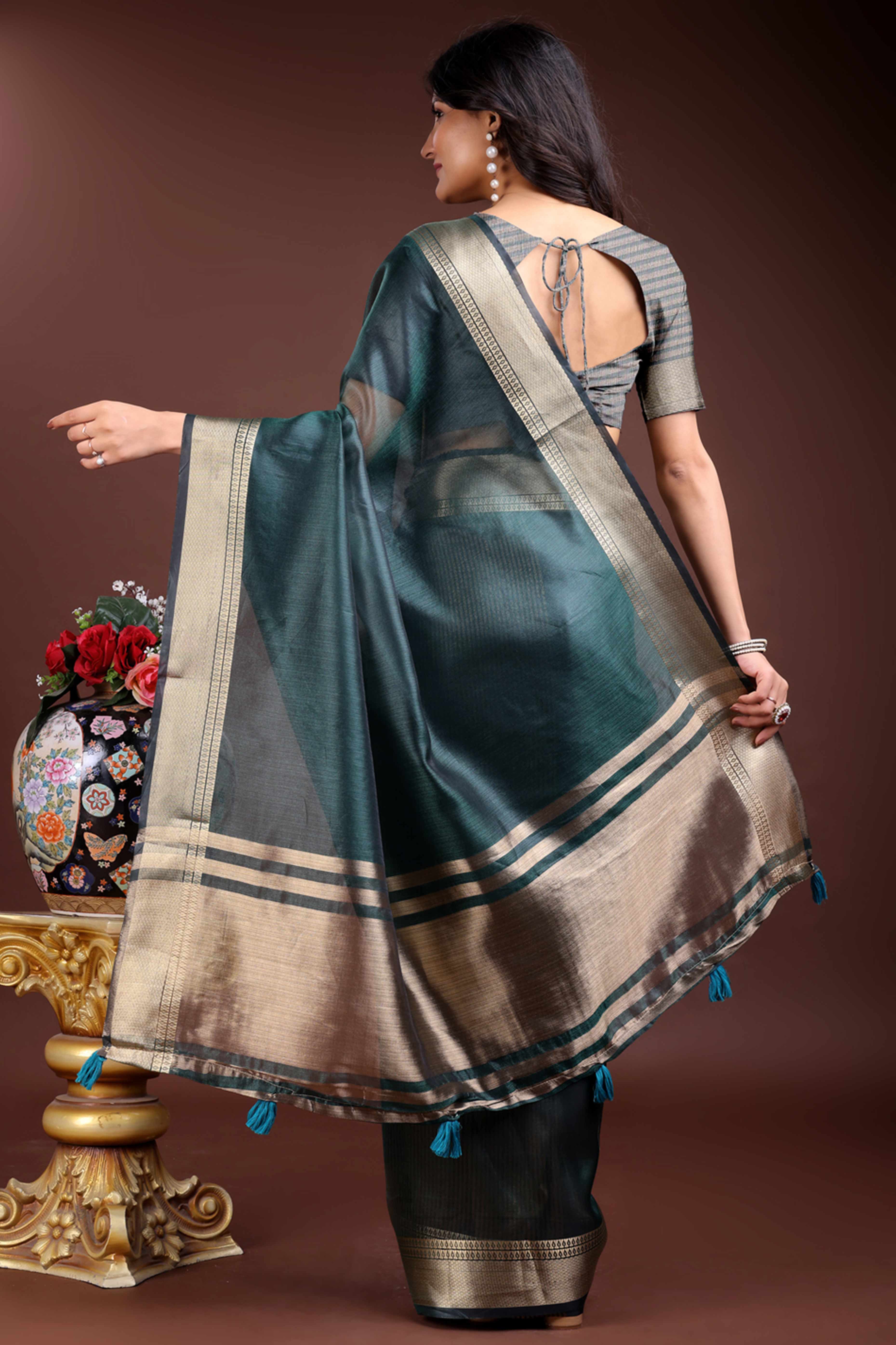 Emerald Green Organza Saree with Zari Border Weaving Charm