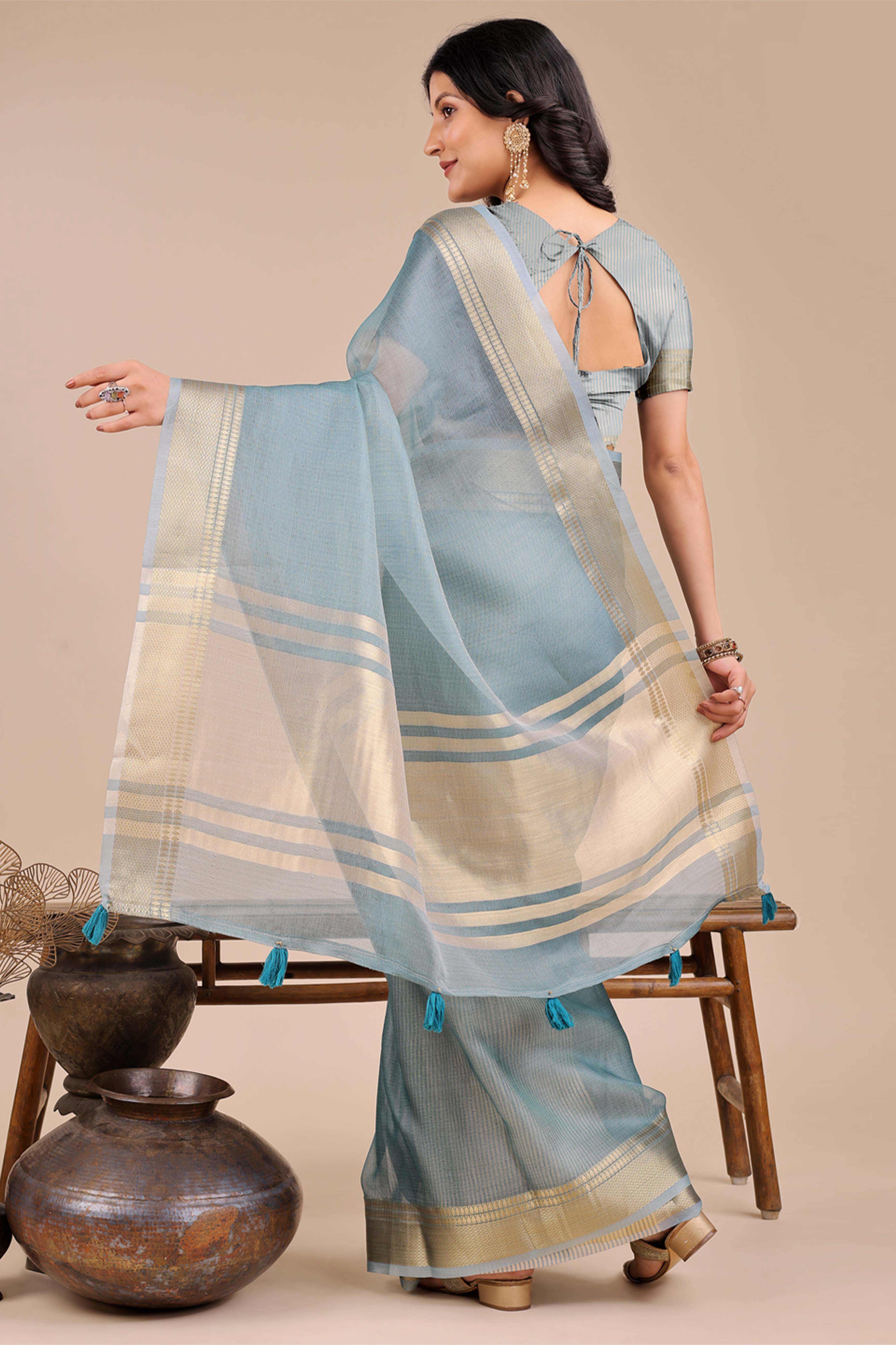 Soft Sea Green Organza Saree with Detailed Zari Woven Edging