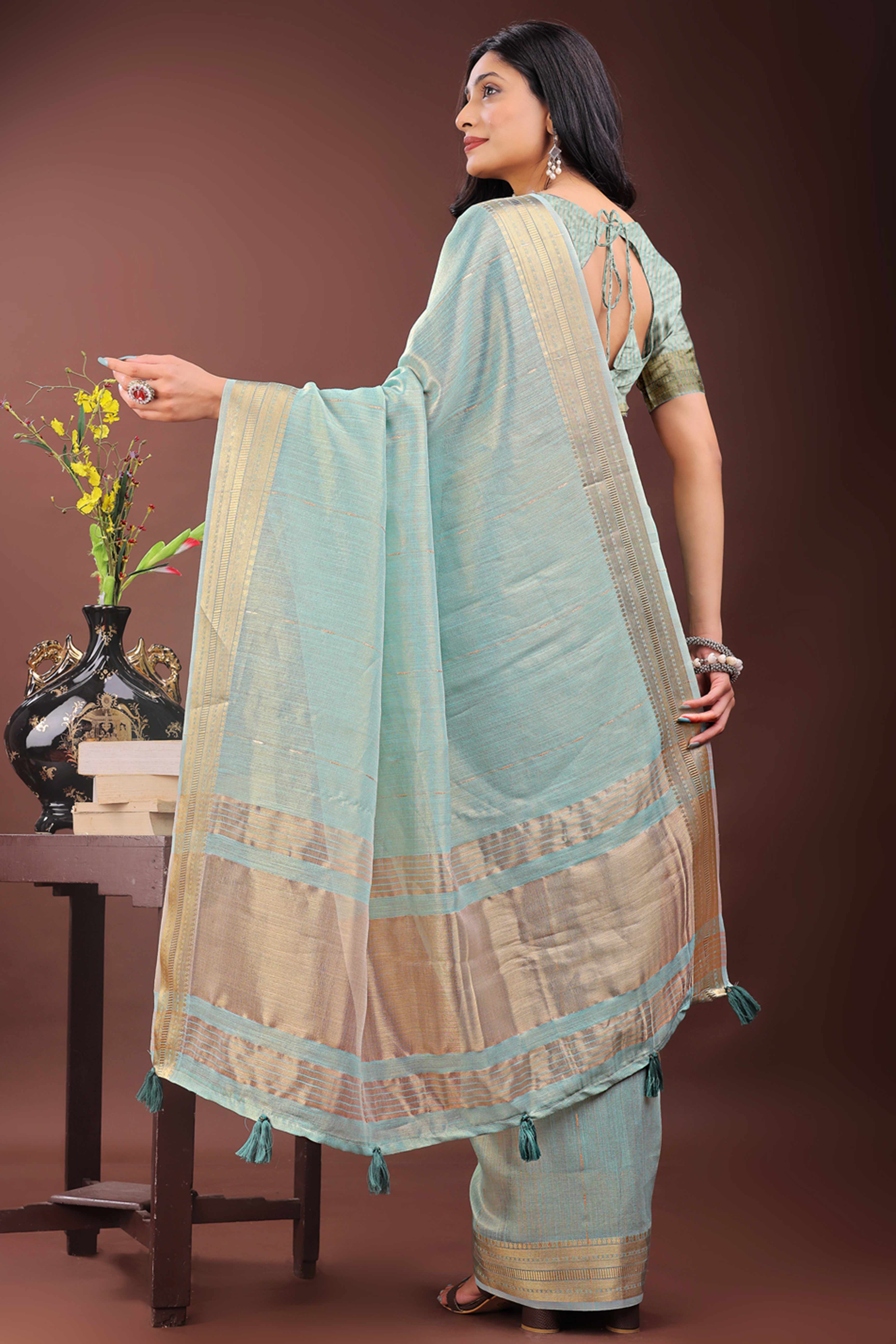 Blue Organza Saree Adorned With Zari Weave & Tassel Edges