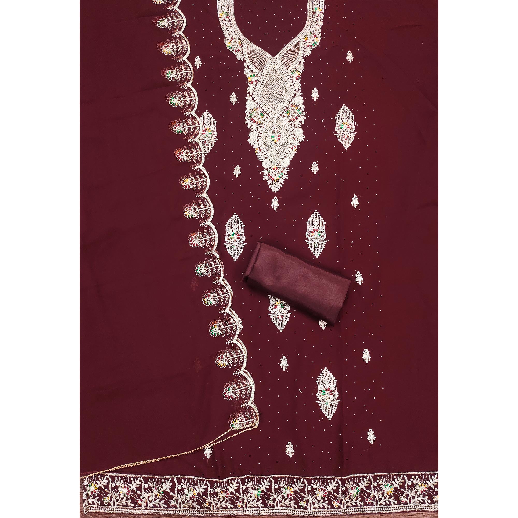 Maroon Georgette Dress Material Adorned With Elegant Floral Embroidery & Shimmering Swarovski Work