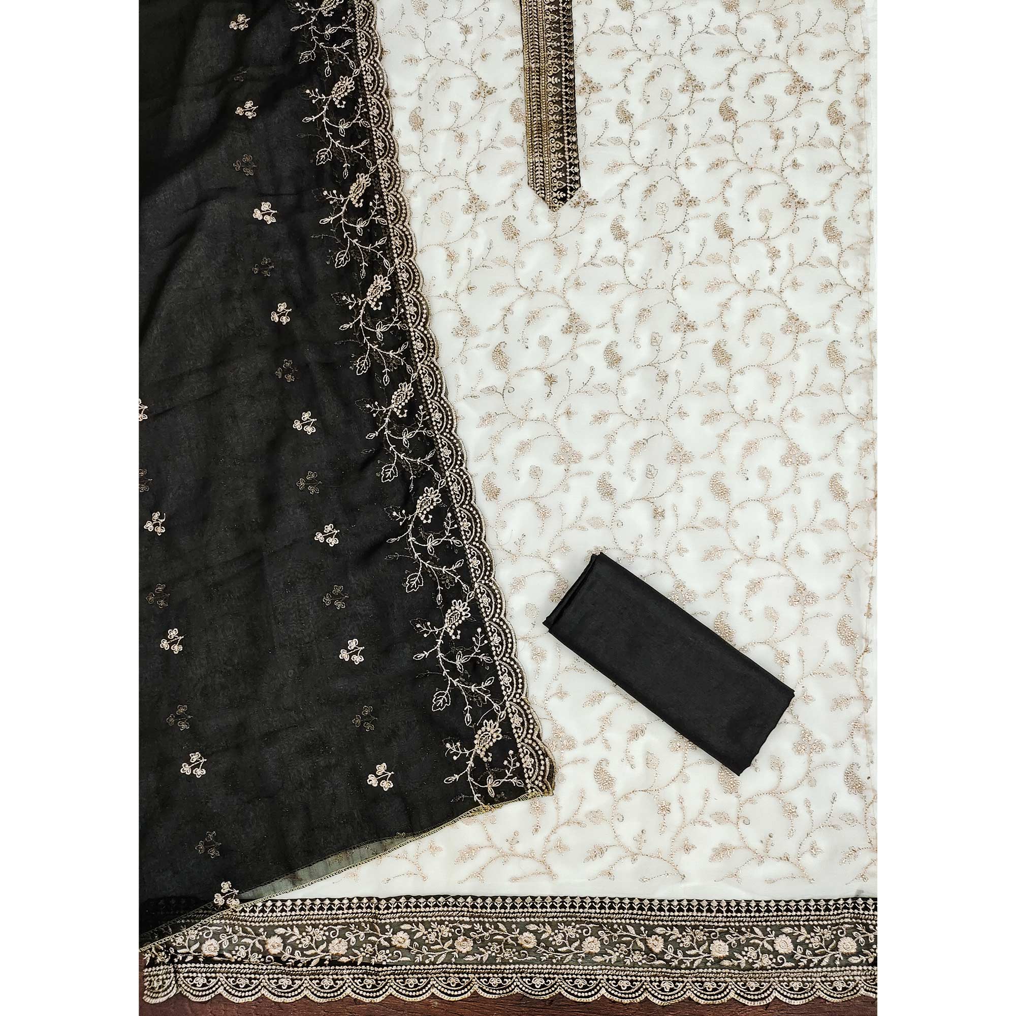 White & Black Georgette Dress Material Showcasing Elegant Floral Thread Embroidery Work