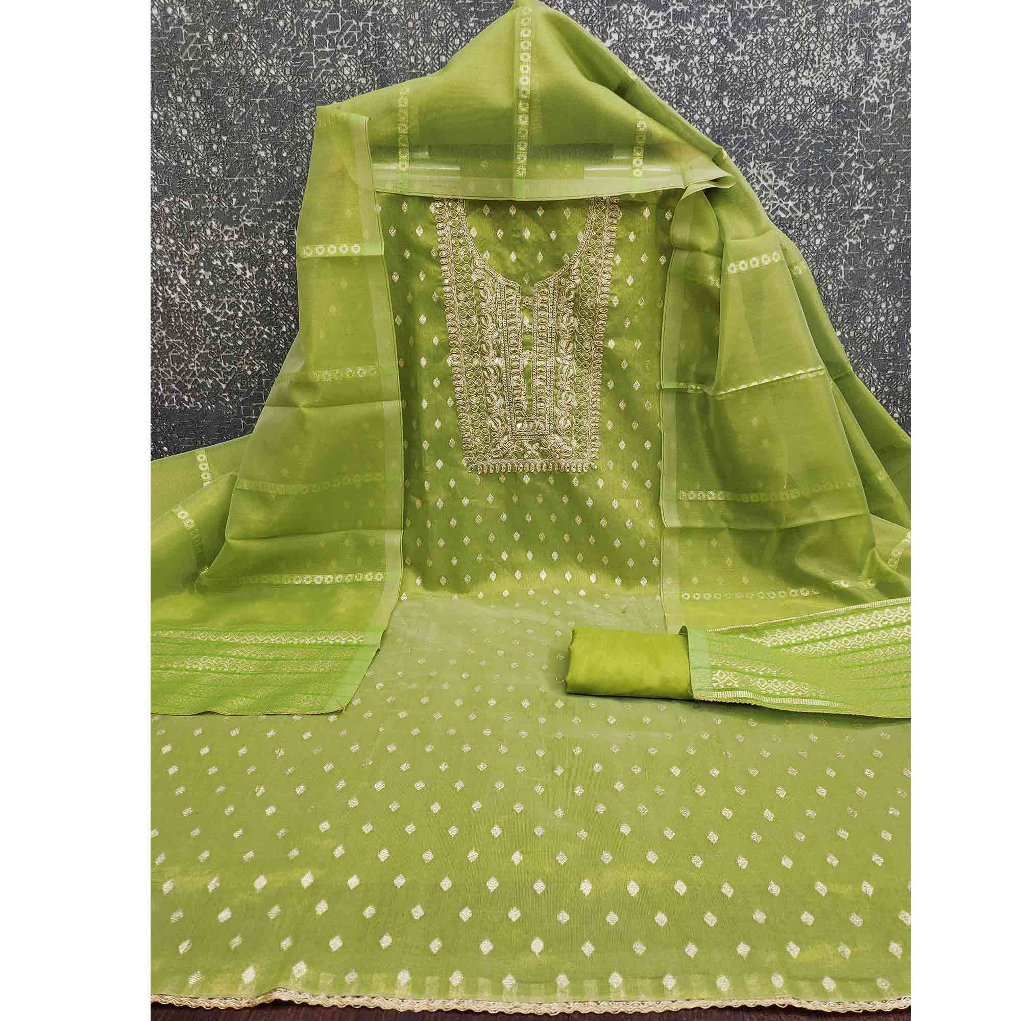 Classic Green Butti Weaving Shimmer Dress Material Enhanced With Sequins Cording Embroidery