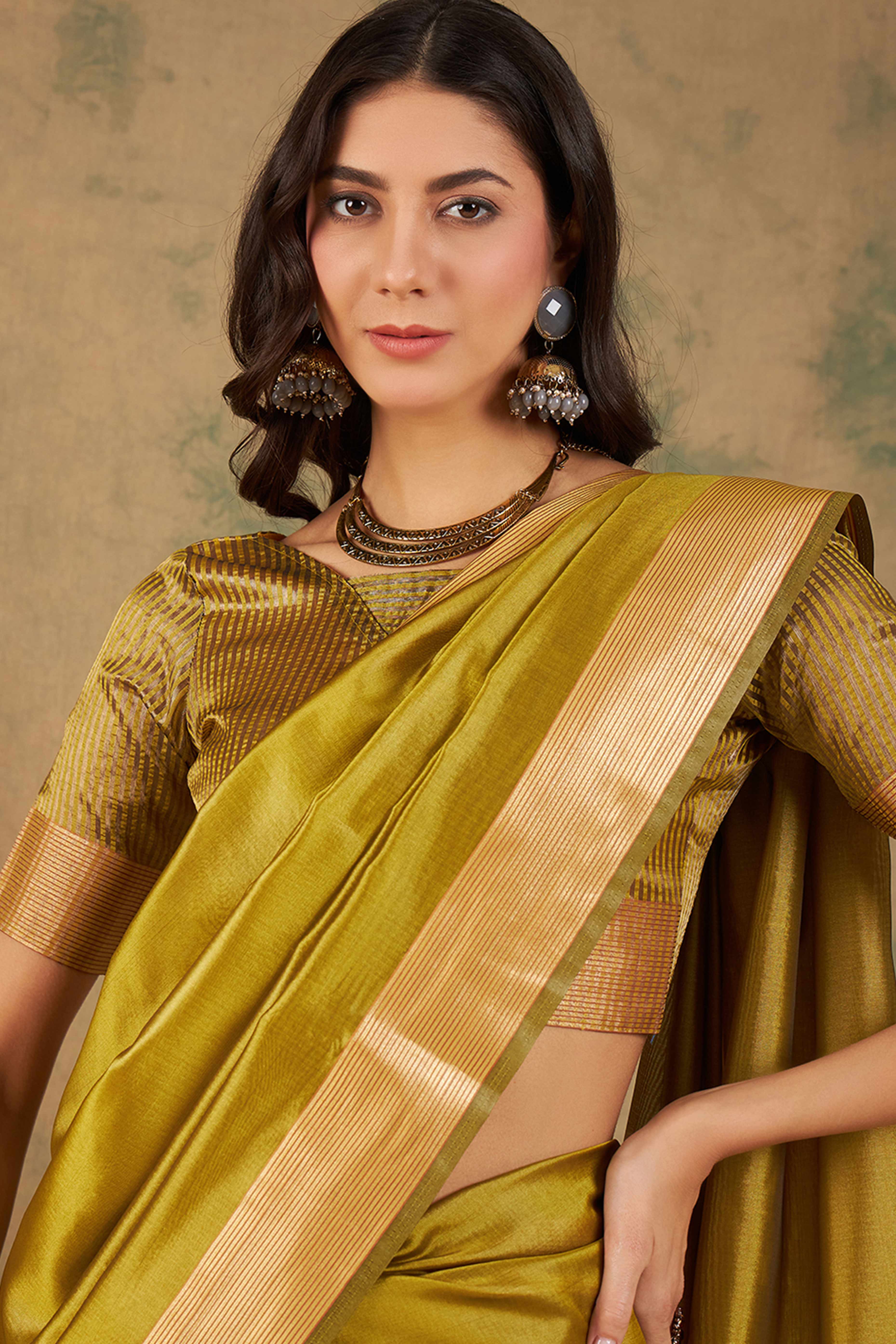 Olive Green Organza Saree In Organza With Delicate Weaving Border And Tassel Details