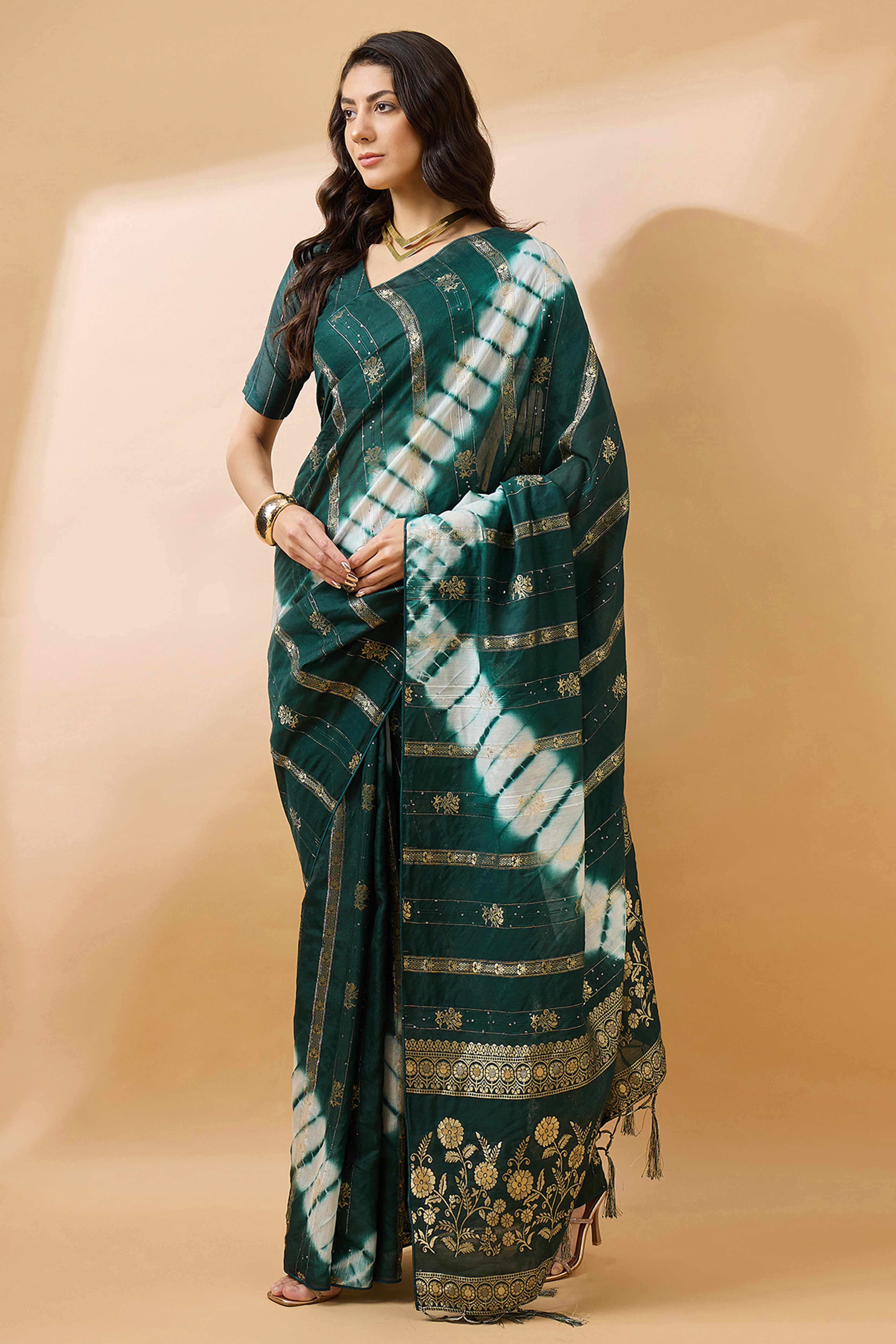 Green Floral Woven Staple Cotton Blend Saree Highlighted With Sequins Embroidery & Tasselled Pallu