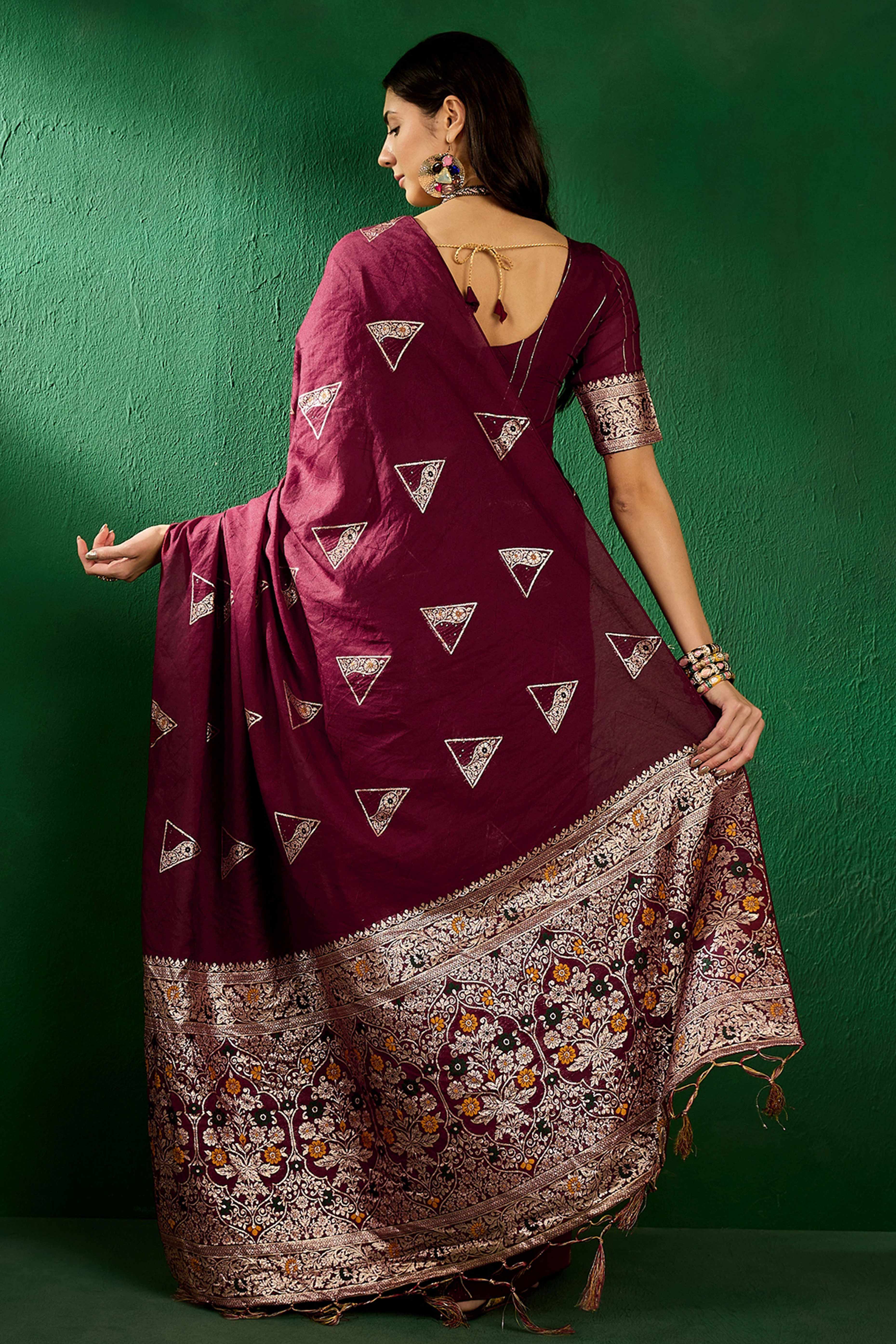 Wine Floral Woven Staple Cotton Blend Saree With Sparkling Sequin Embroidery & Graceful Tassel Pallu