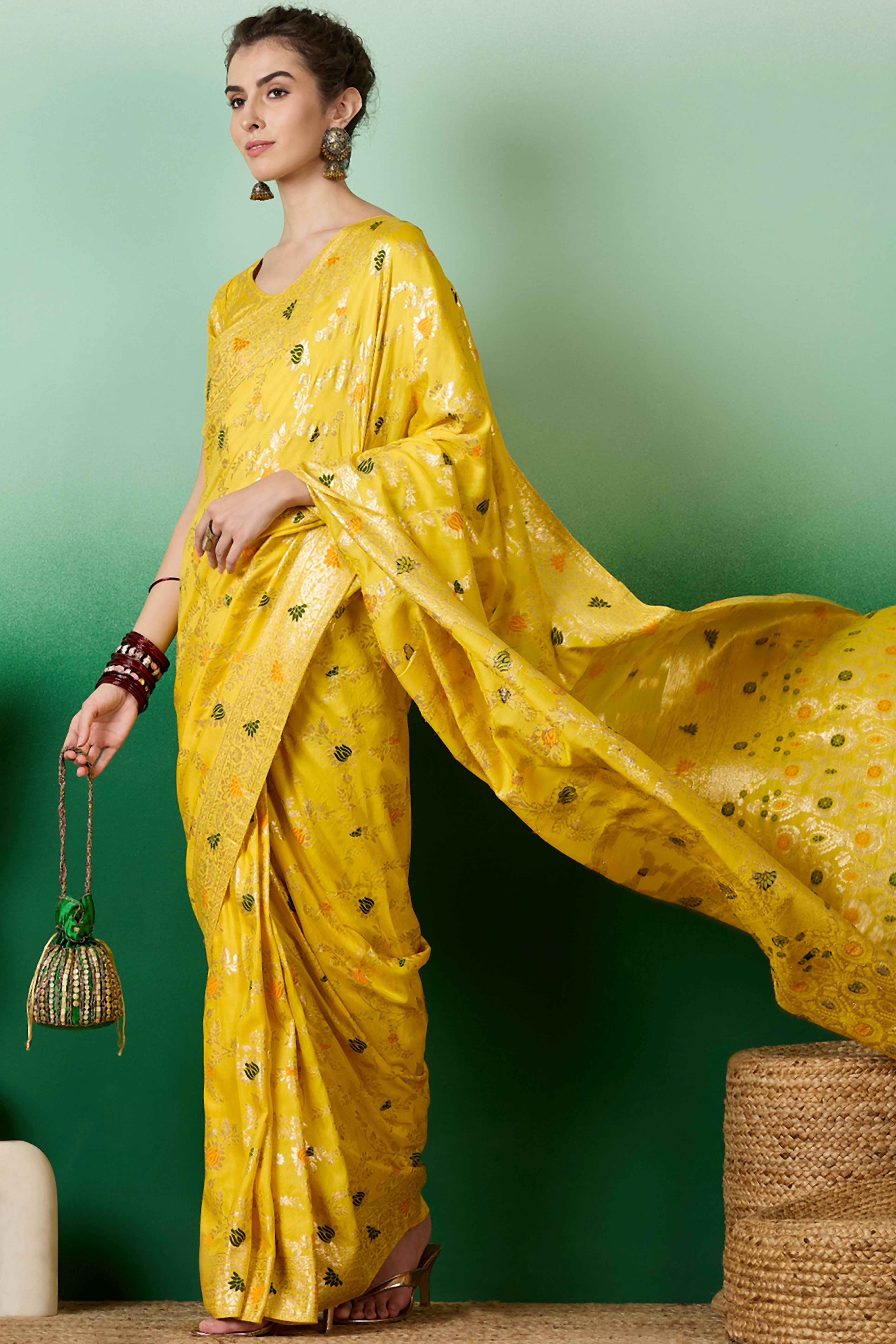 Yellow Cotton Meena jacquard Saree Featuring Intricate Floral Weaving & Tassels On The Pallu
