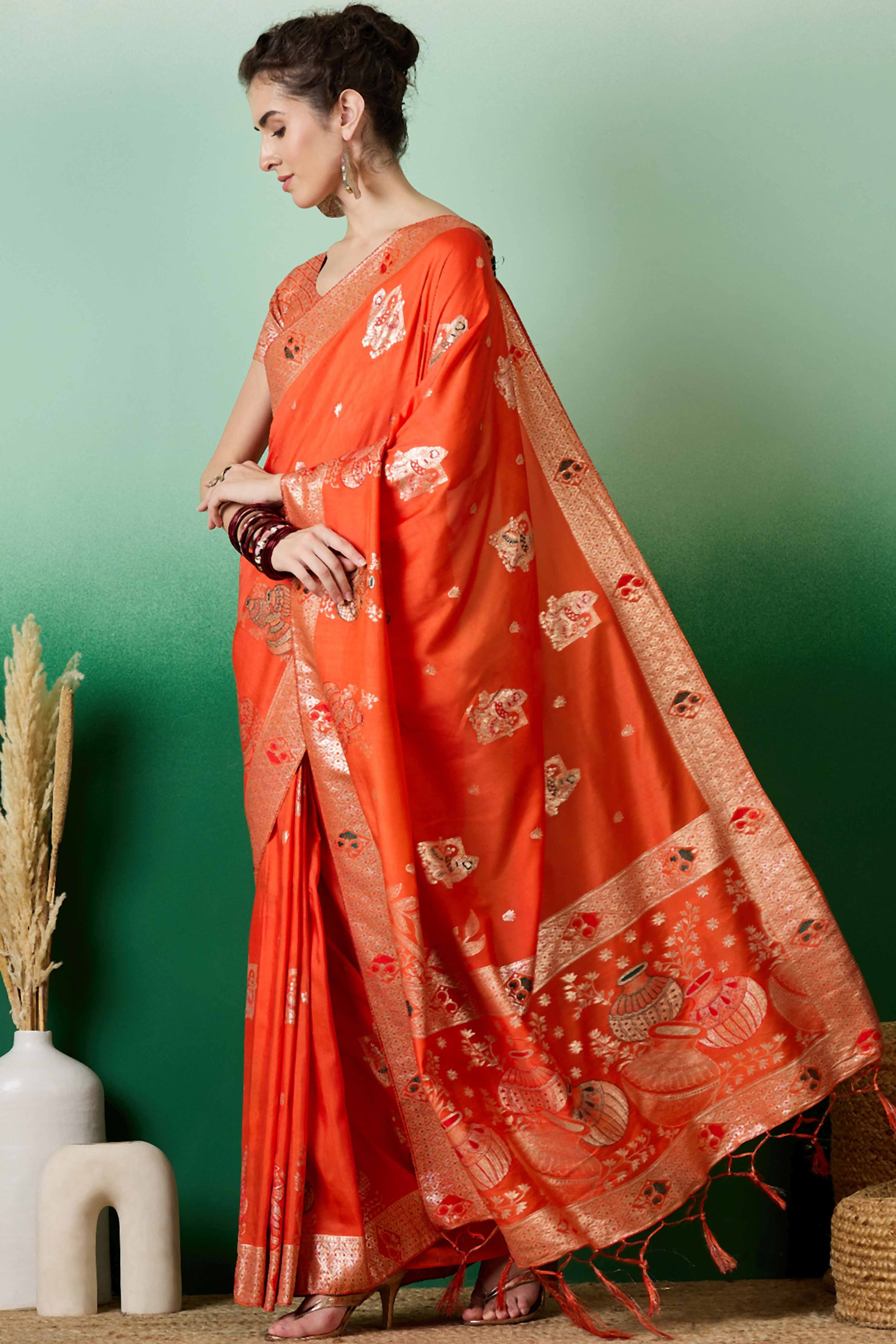 Orange Cotton Blend Saree Adorned With Floral Zari Weaving & Soft Tassel Accents