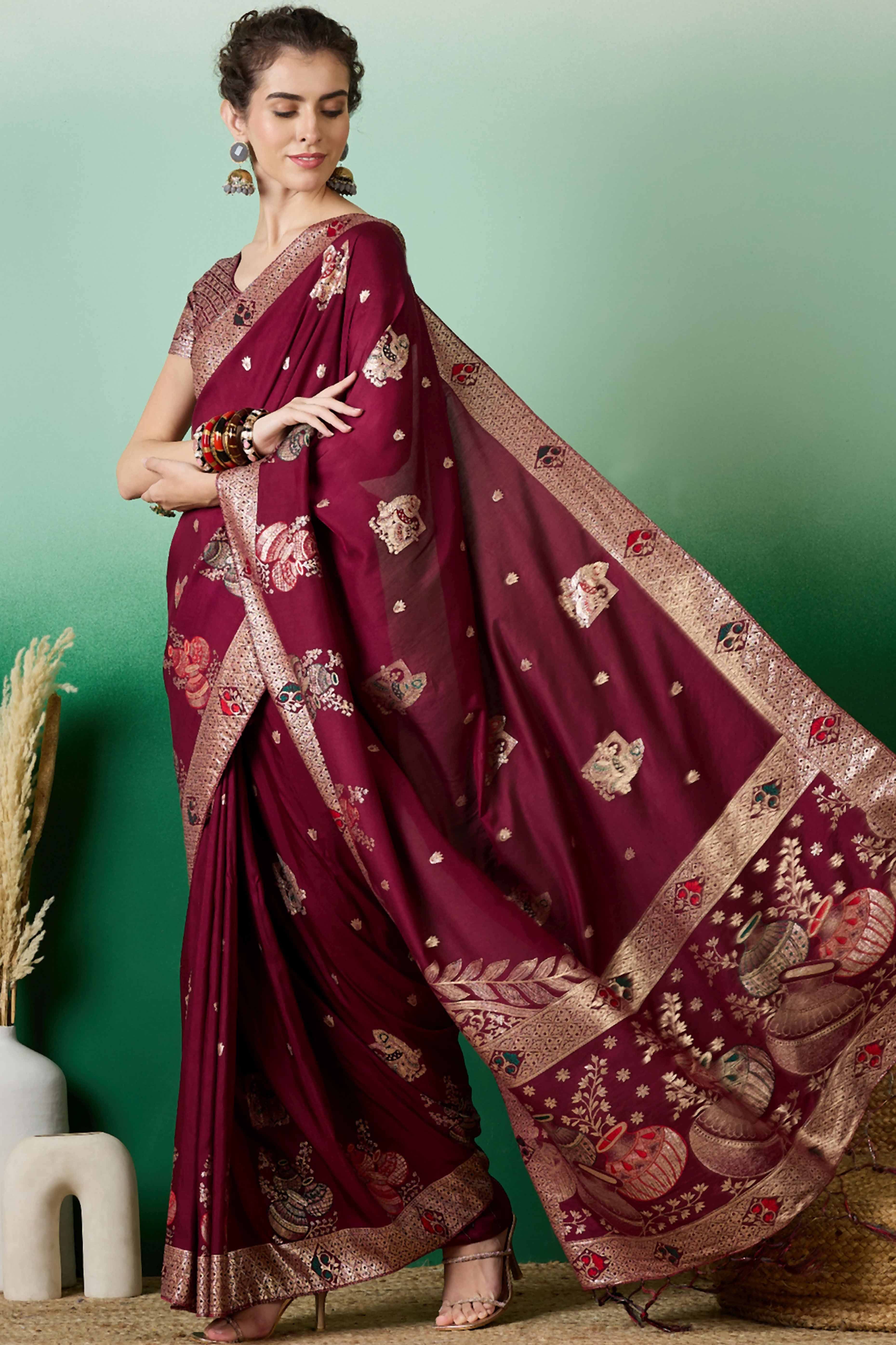 Wine Cotton Blend Saree Adorned With Floral Zari Weaving & Soft Tassel Accents