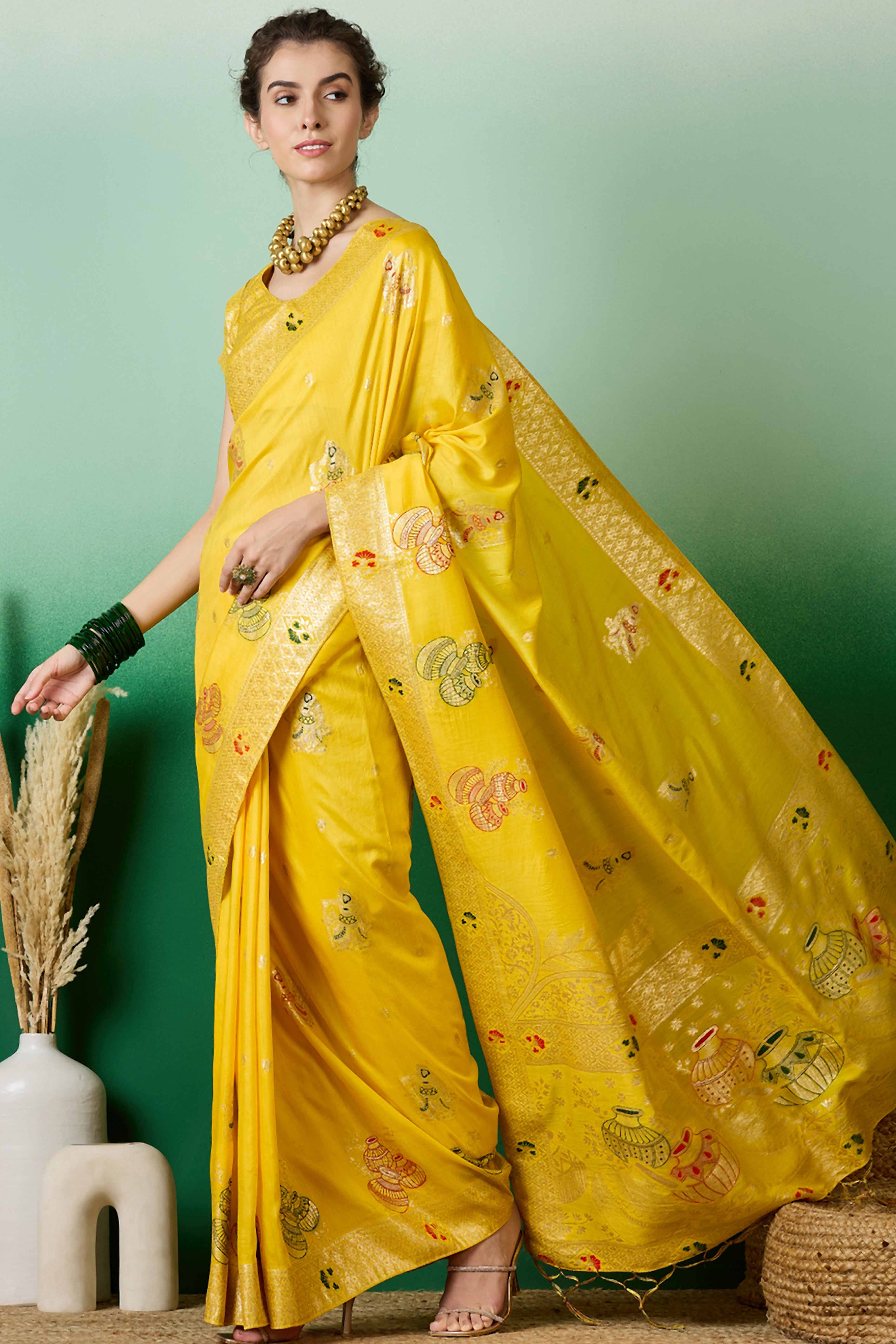 Yellow Cotton Blend Saree Adorned With Floral Zari Weaving & Soft Tassel Accents