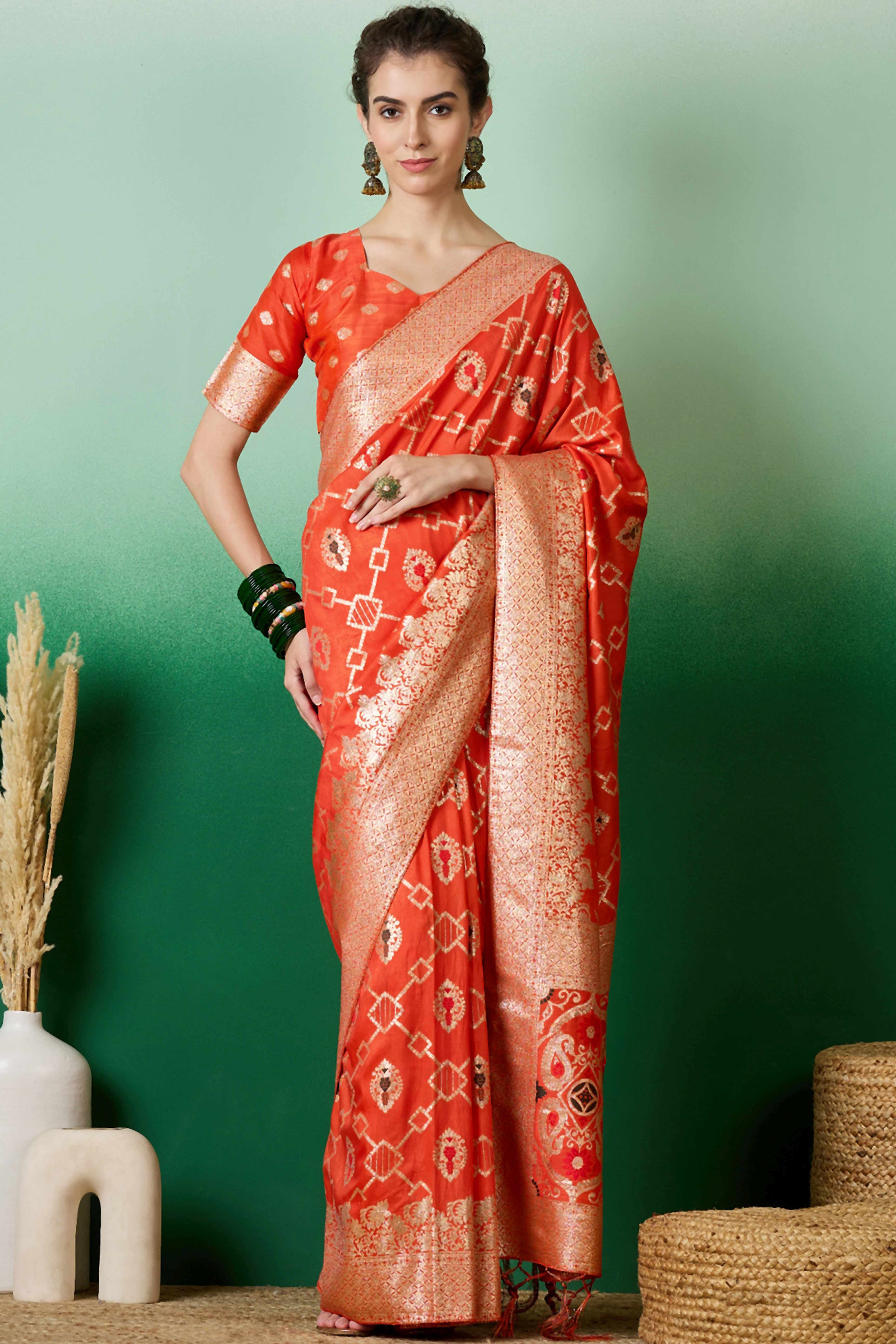 Orange Zari Woven Staple Cotton Blend Saree With Floral Motifs & Tassel Detailed Pallu