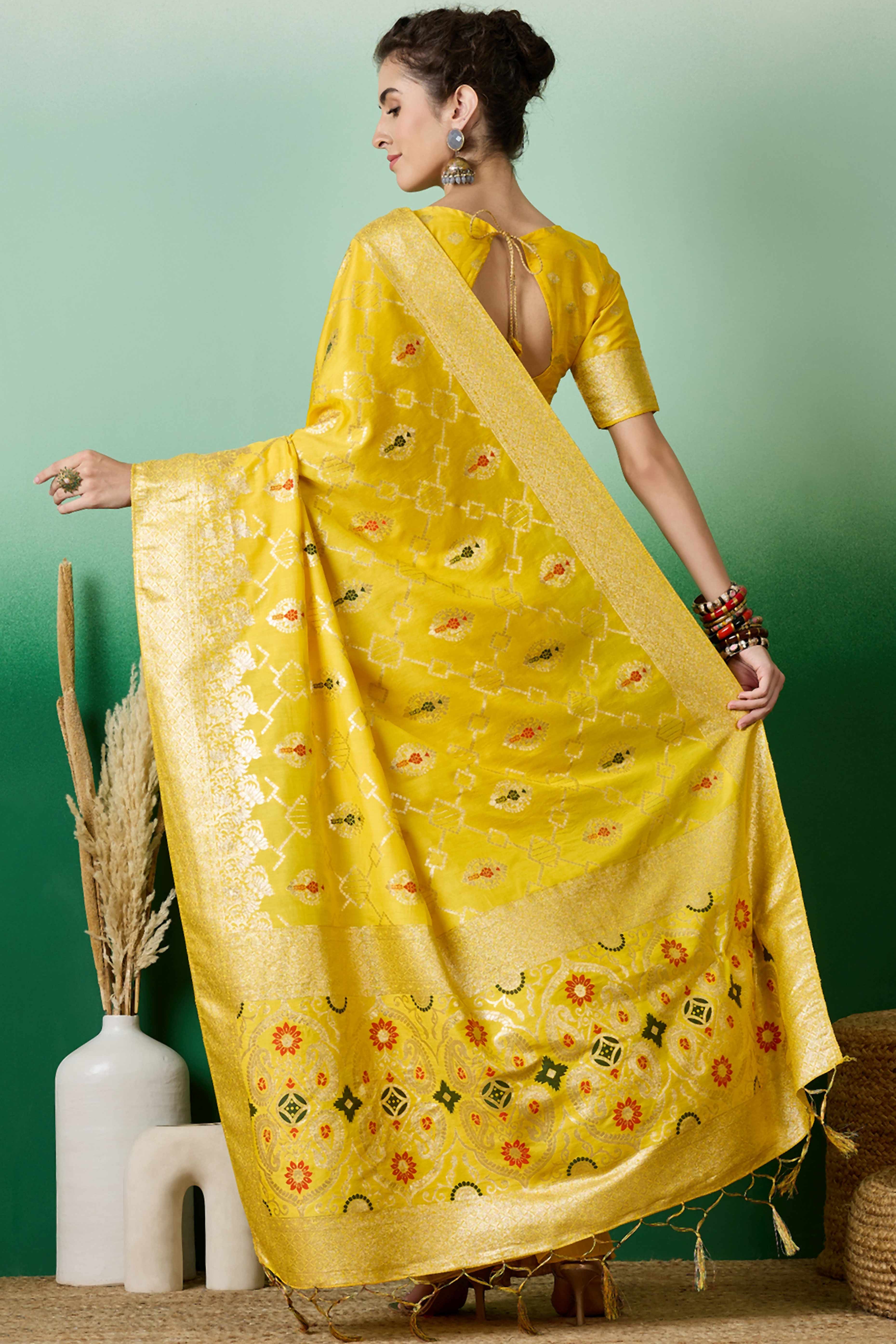 Yellow Zari Woven Staple Cotton Blend Saree With Floral Motifs & Tassel Detailed Pallu