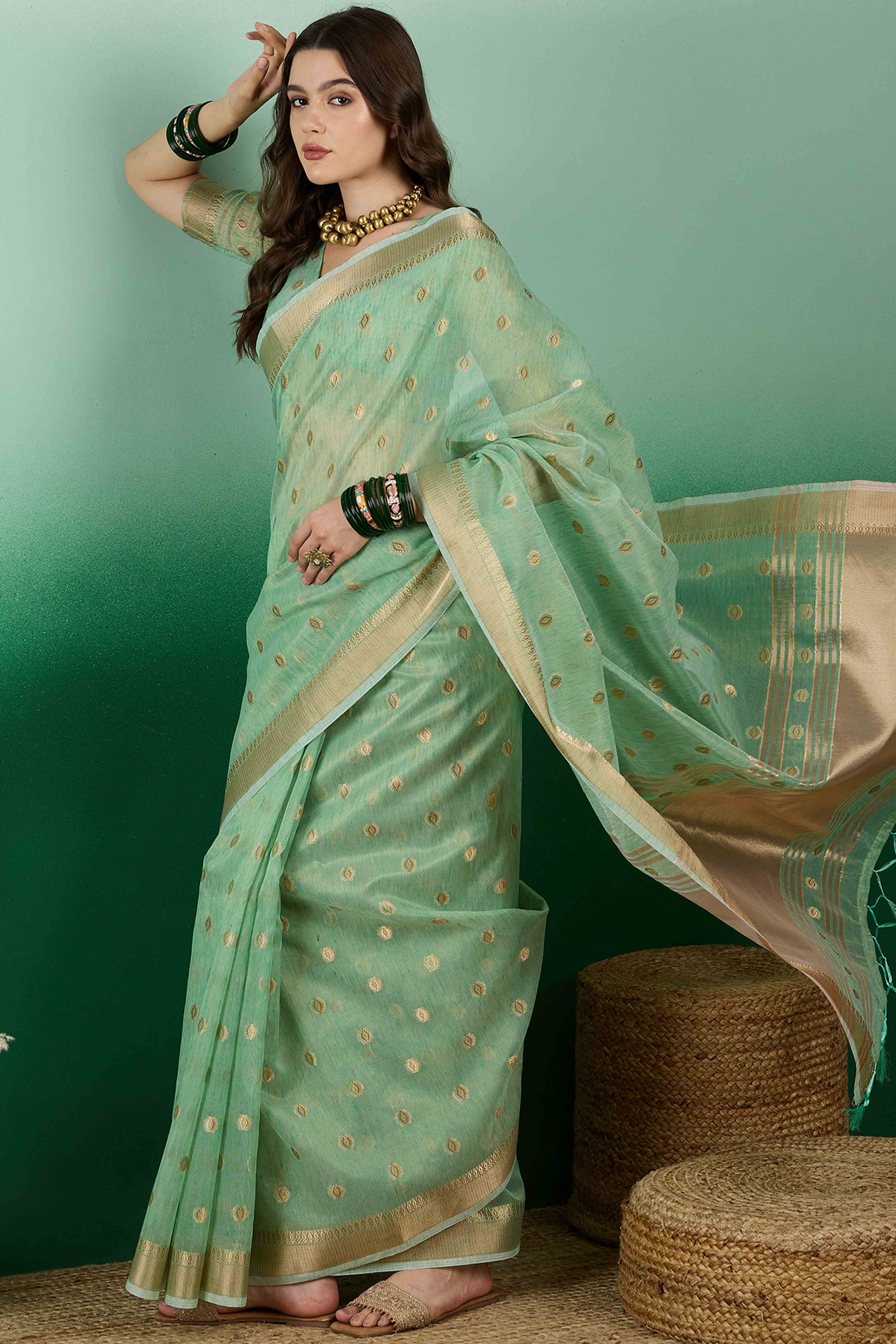 Green Khadi Organza Saree Embellished With Traditional Zari Work & Tassels