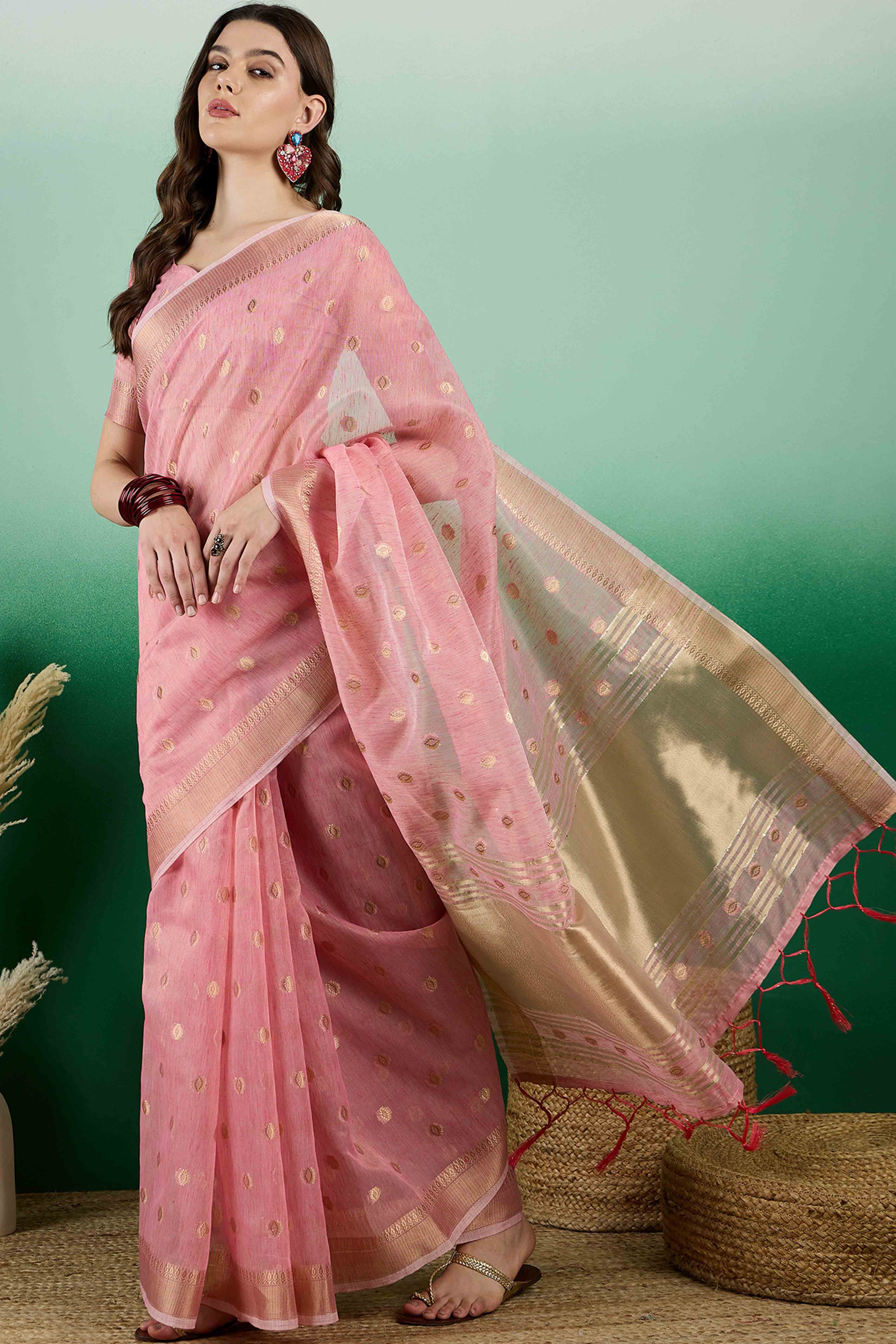 Pink Khadi Organza Saree Embellished With Traditional Zari Work & Tassels
