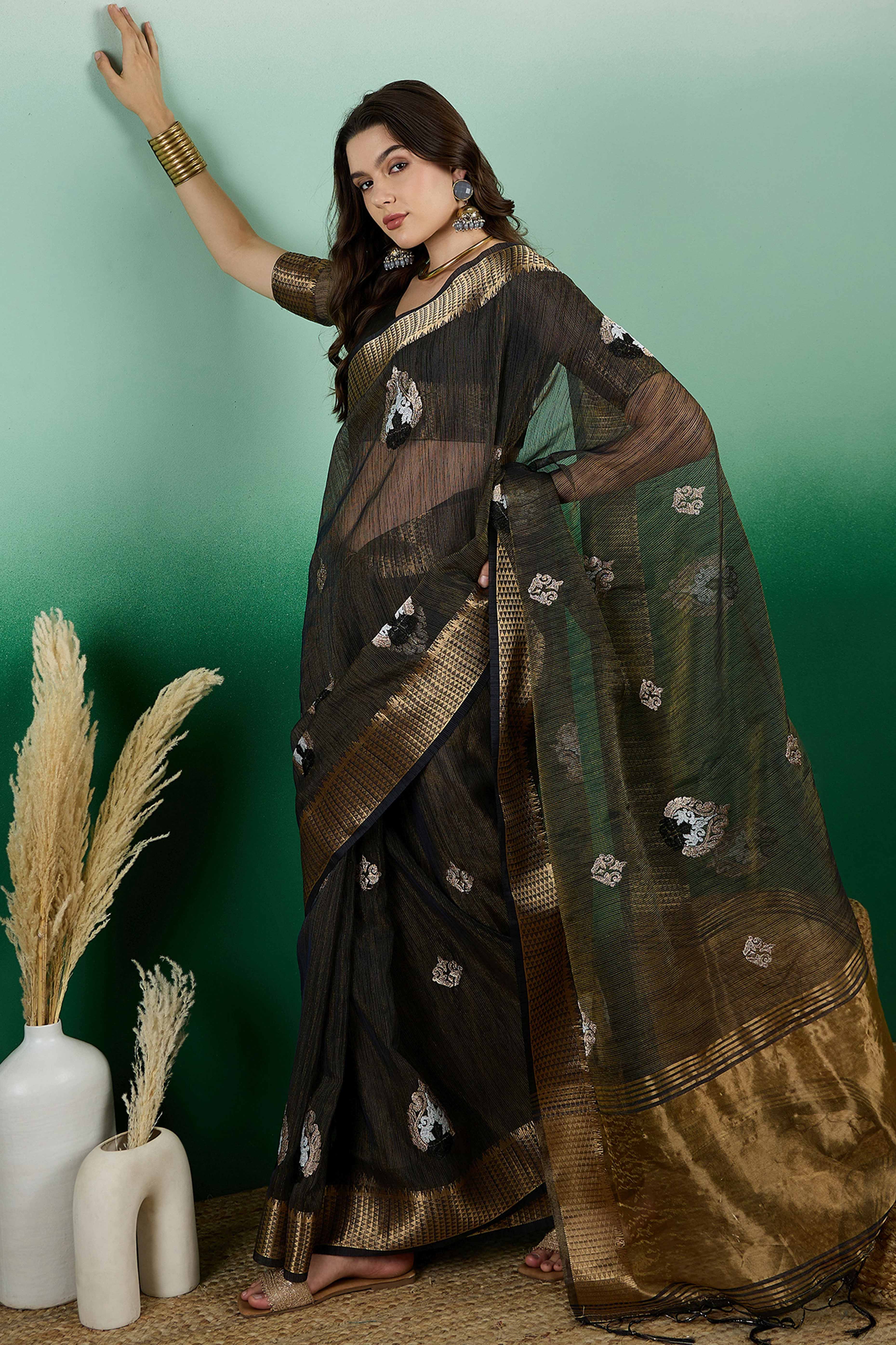 Black Khadi Organza Saree Adorned With Elegant Embroidery & Tassel Pallu