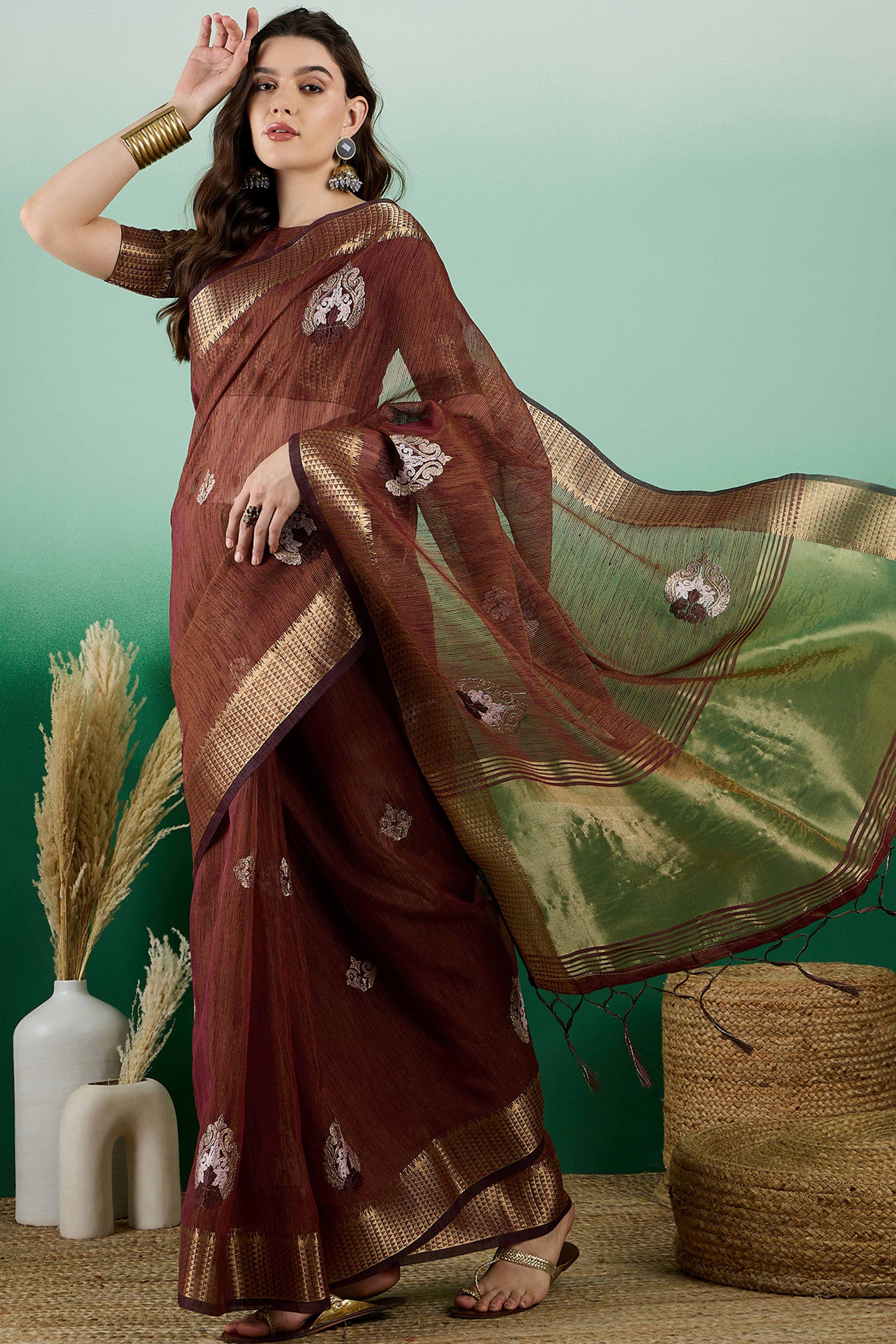 Brown Khadi Organza Saree Adorned With Elegant Embroidery & Tassel Pallu