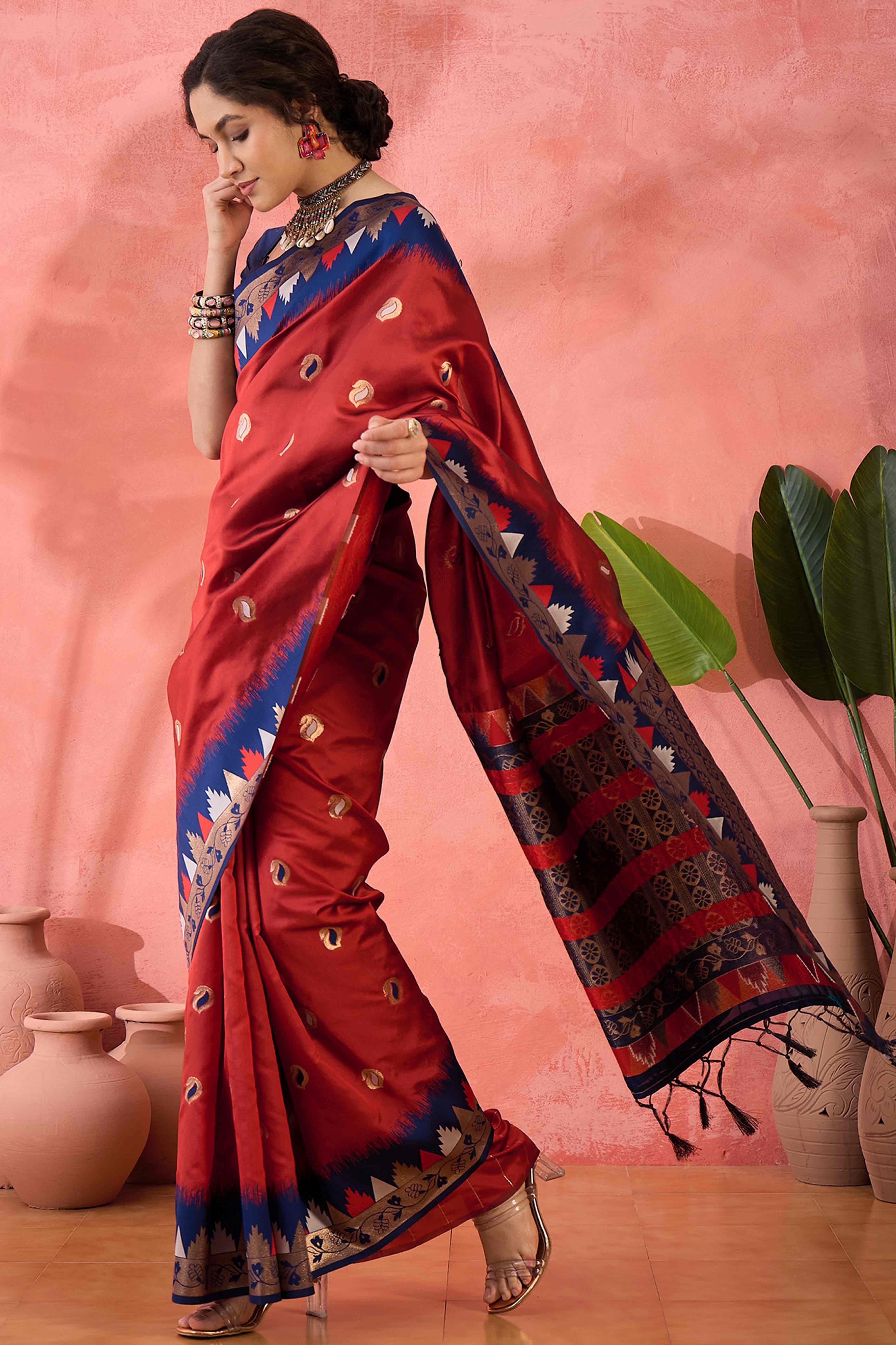 Maroon Zari Woven Poly Silk Saree Enhanced With Graceful Tassel Detailing