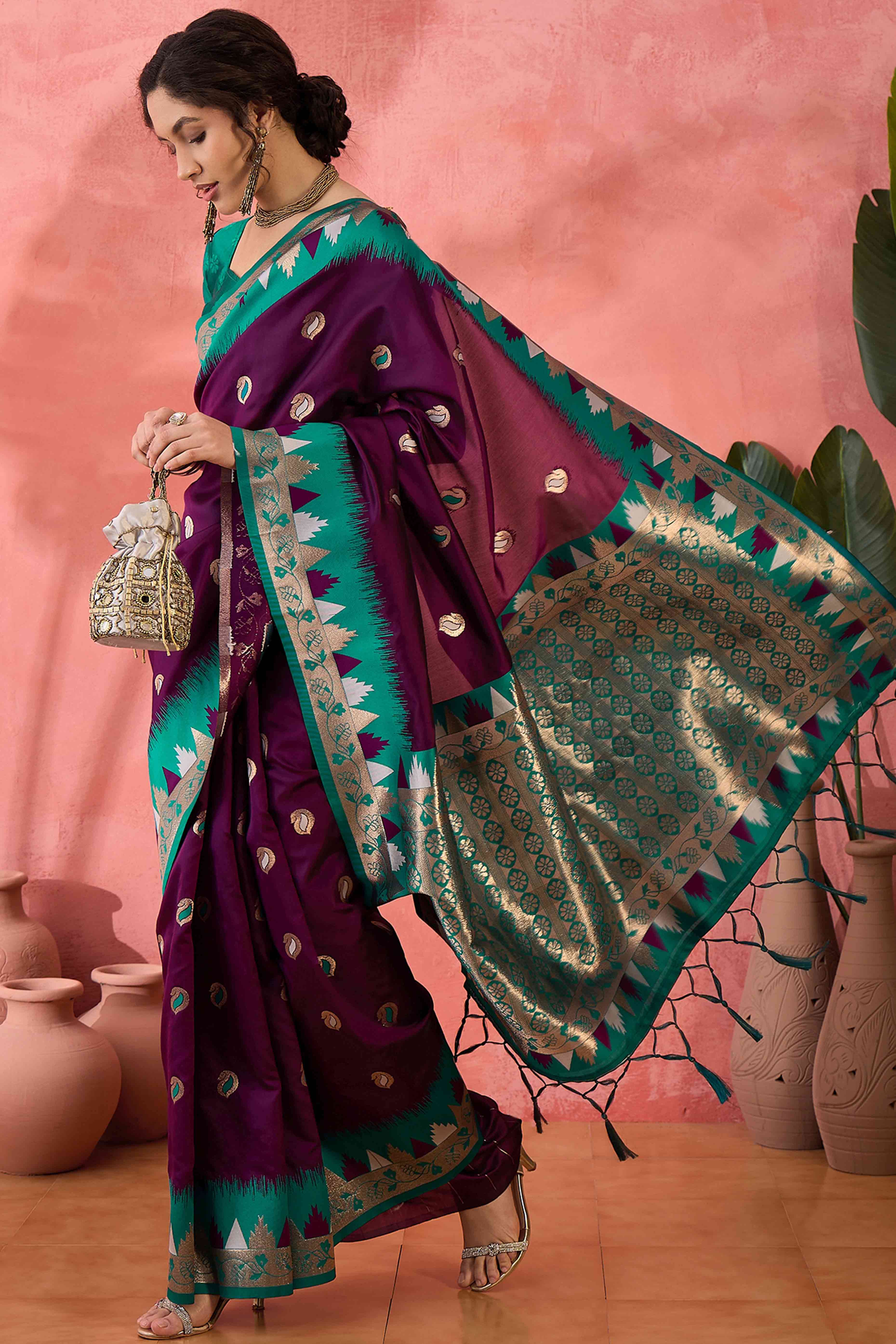 Wine Zari Woven Poly Silk Saree Enhanced With Graceful Tassel Detailing