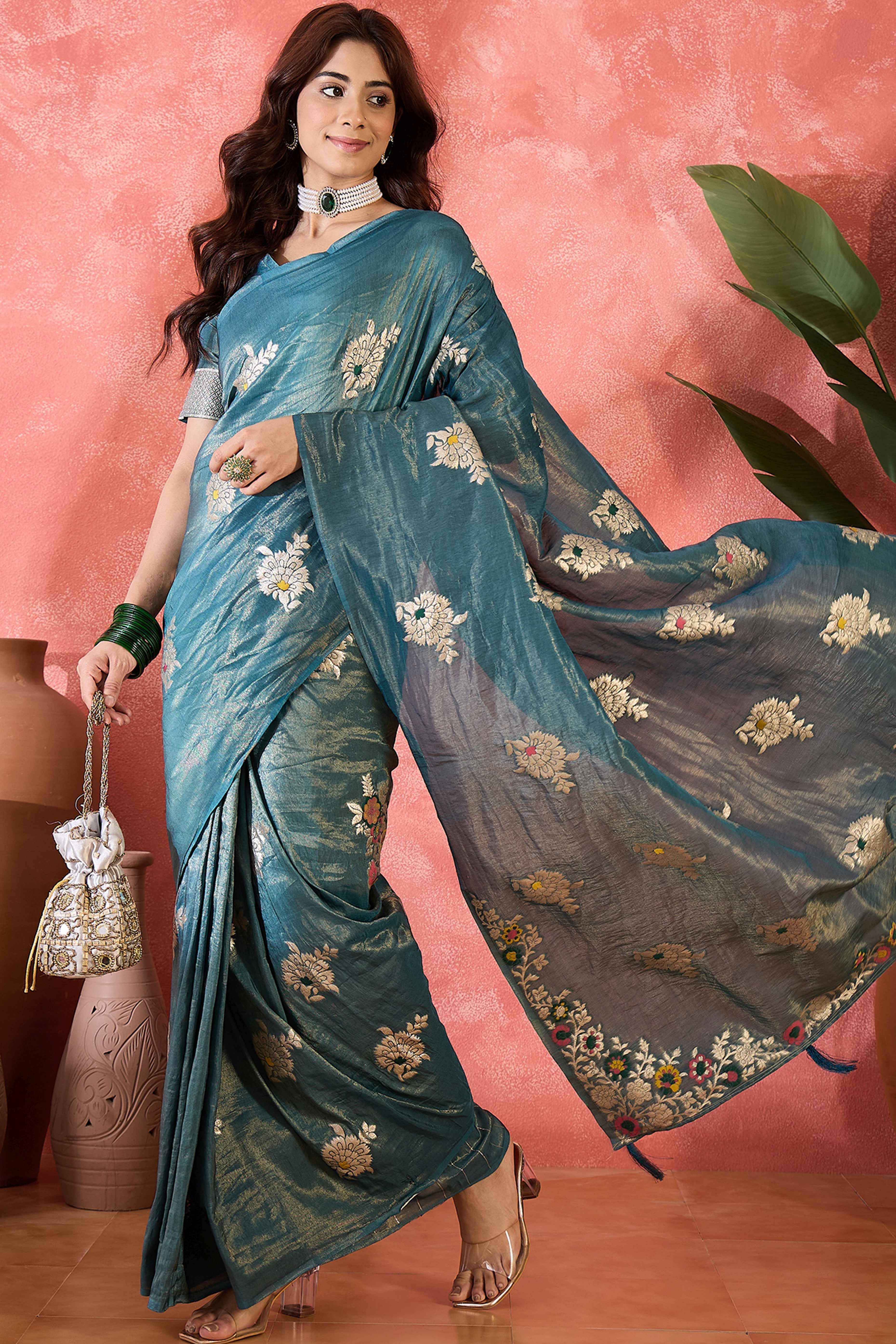 Teal Shimmer Saree Featuring Intricate Floral Zari Weaving & Tassel Finish