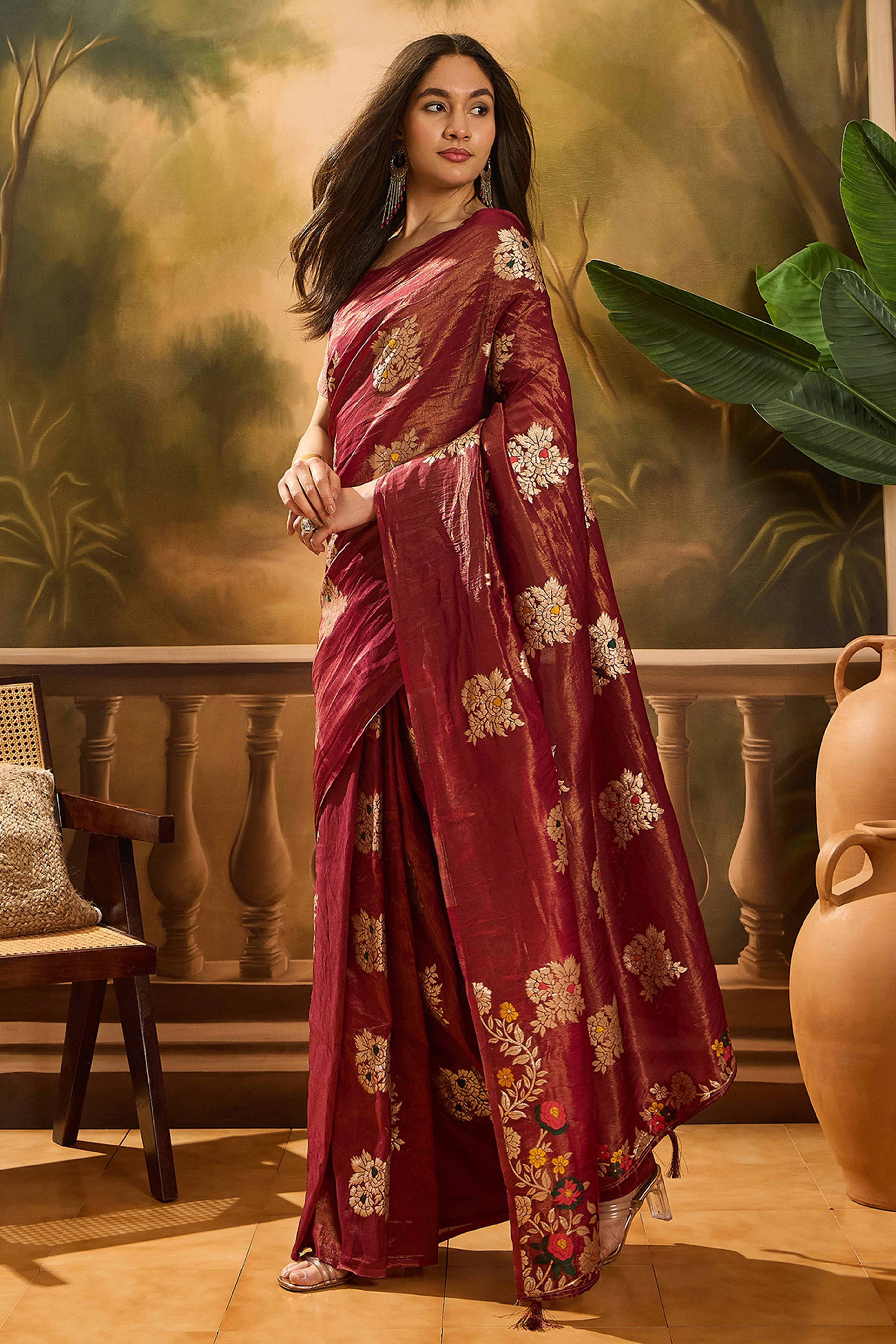 Maroon Saree In Shimmer Fabric With Floral Zari Weaving & Decorative Tassel Pallu