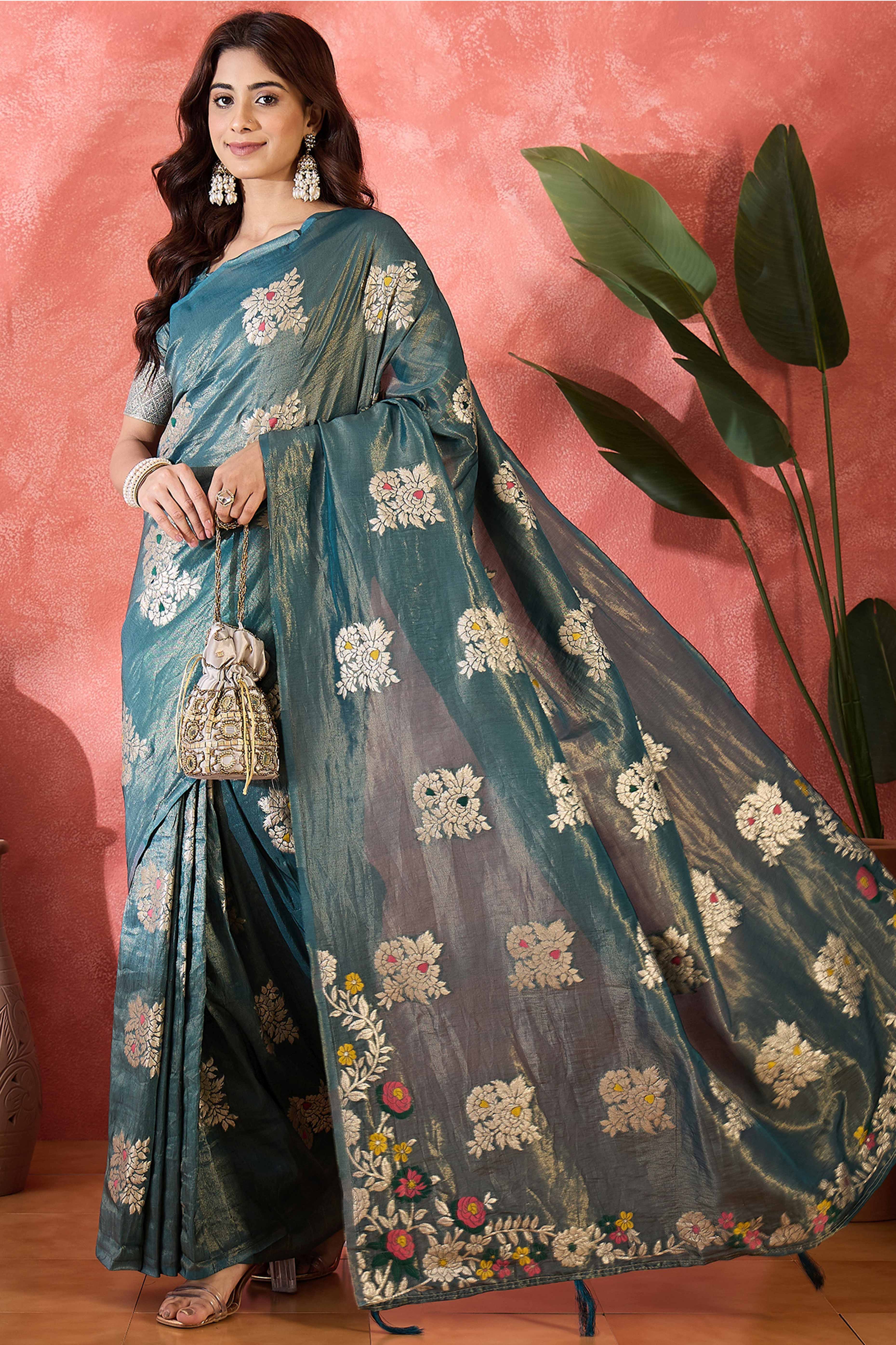 Teal Blue Saree In Shimmer Fabric With Floral Zari Weaving & Decorative Tassel Pallu