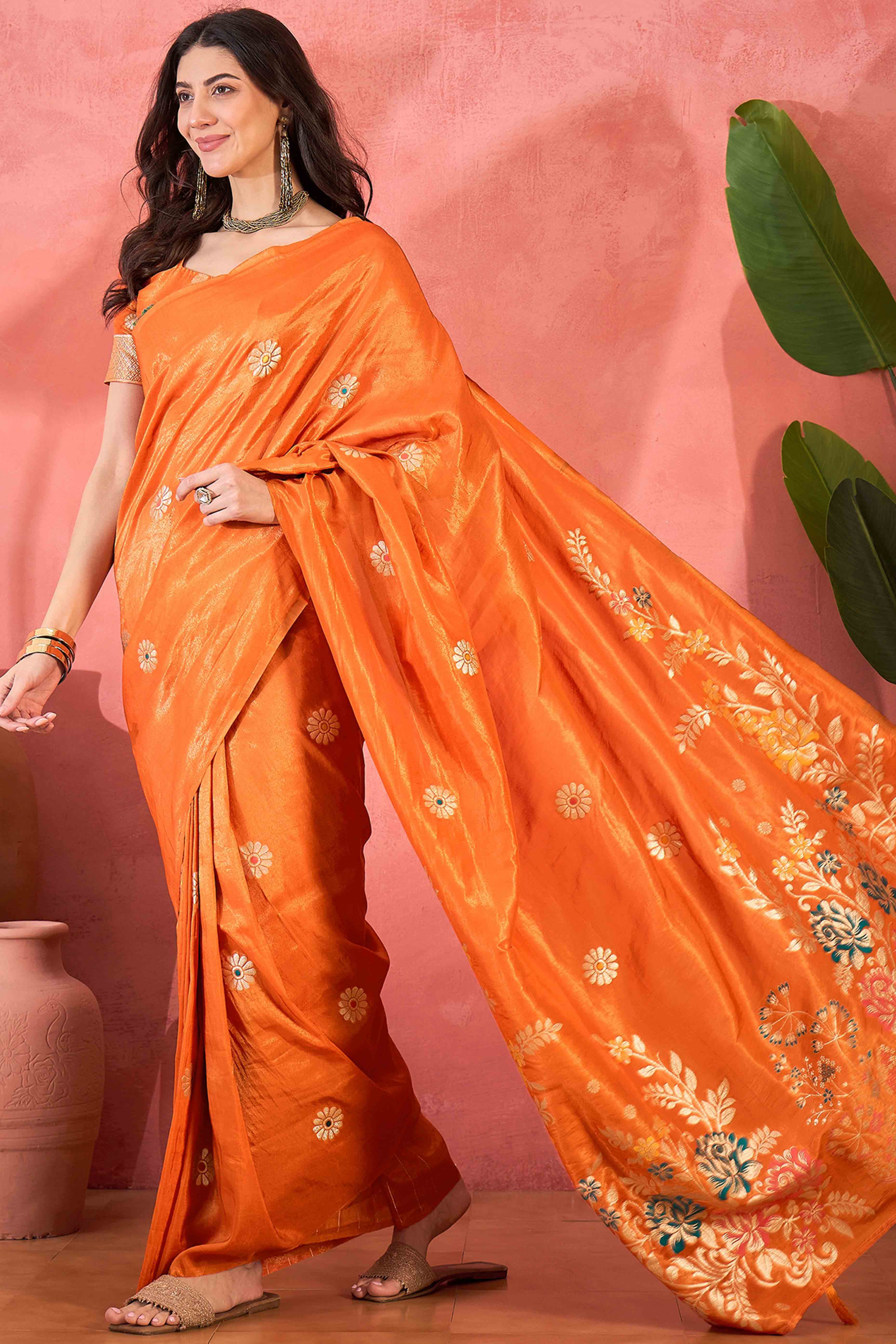Orange Shimmer Saree Adorned with Floral Zari Weaving & Tassel Pallu
