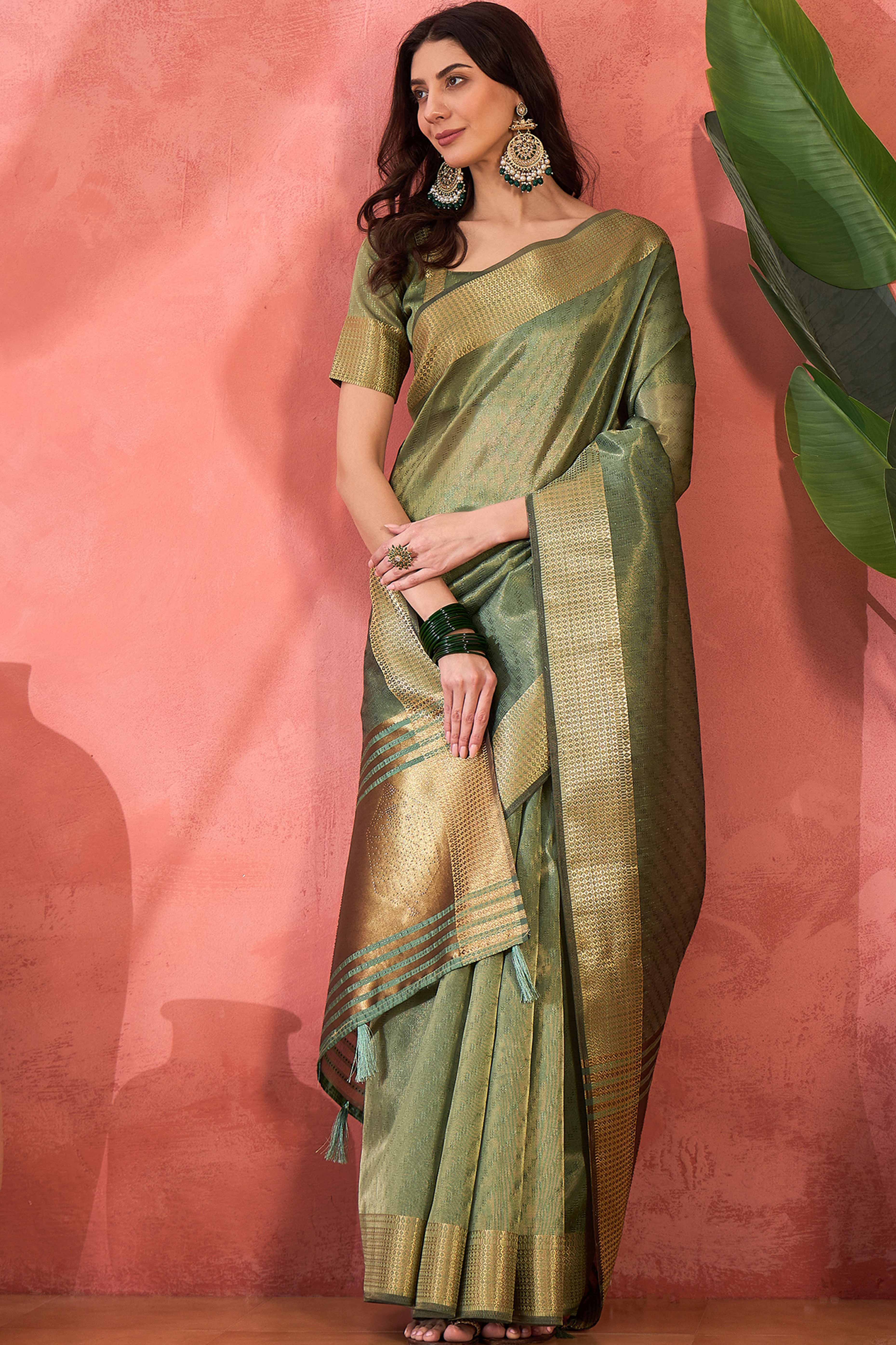 Green Khadi Organza Saree Intricate Weaving & Sparkling Stonework With Tassel Pallu
