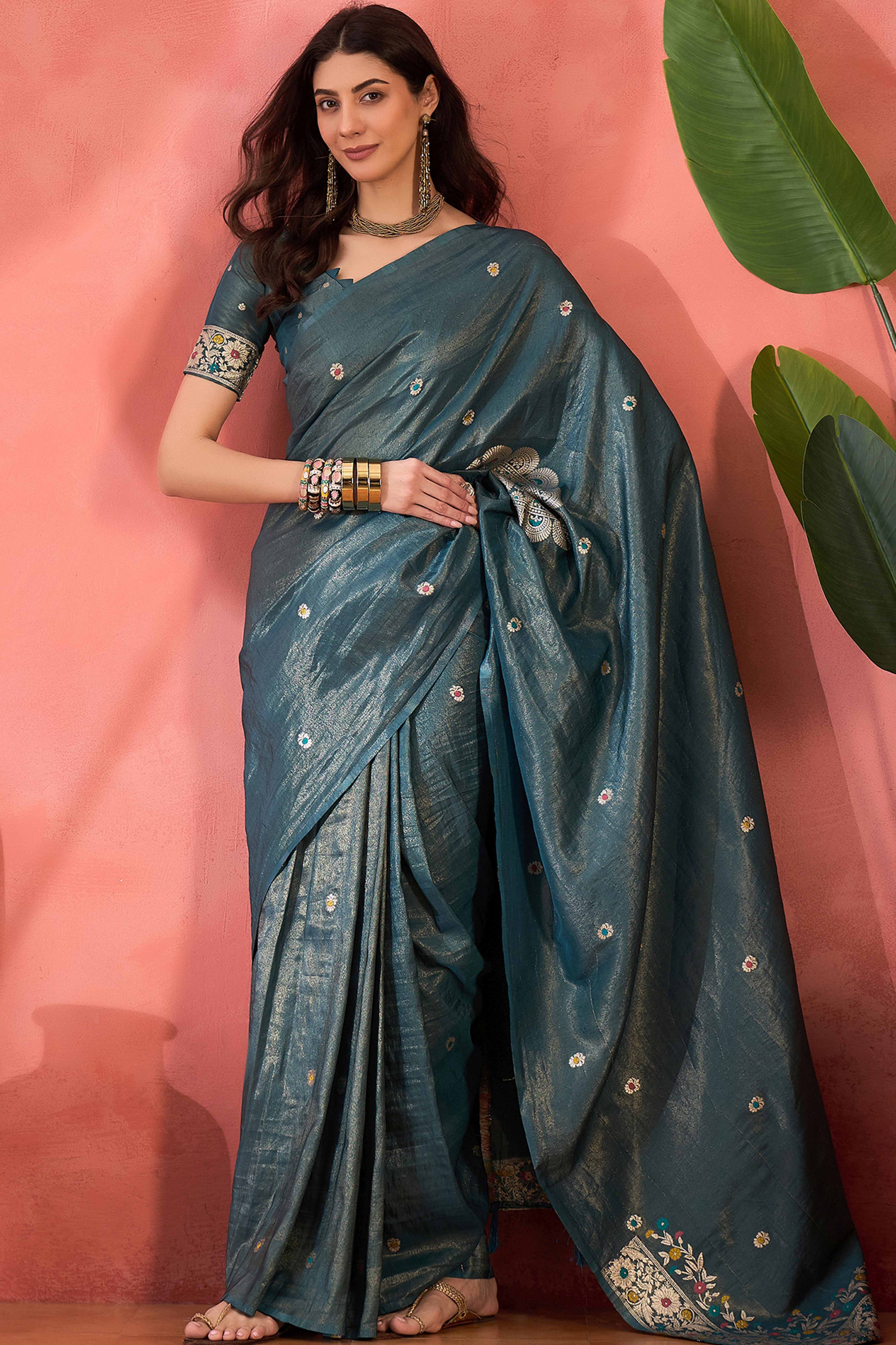 Teal Blue Zari Woven Shimmer Saree With Floral Motifs & Flowing Tassel Pallu