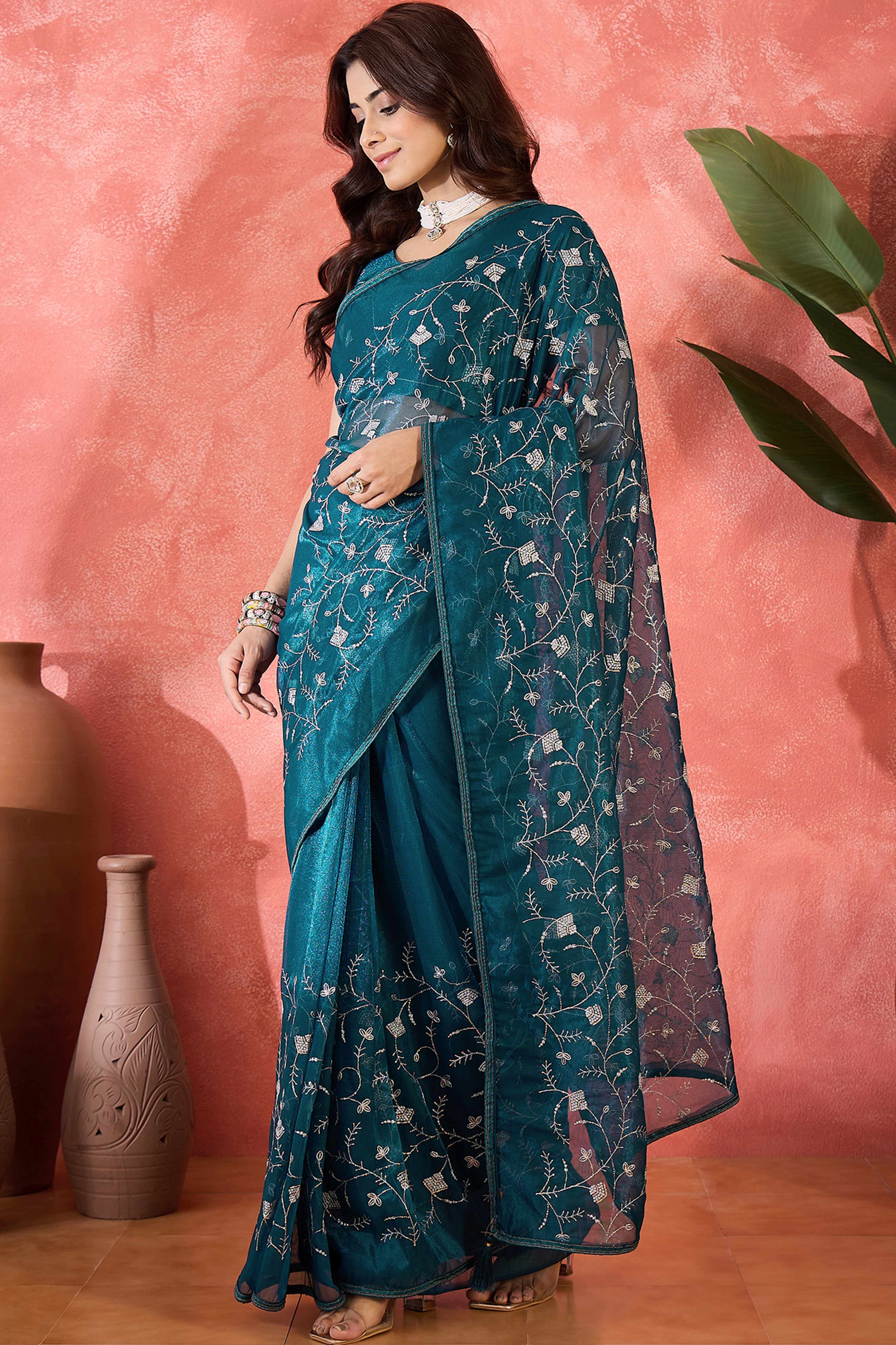 Teal Floral Sequin Embellished Saree In Twill Net With Tassel Accents