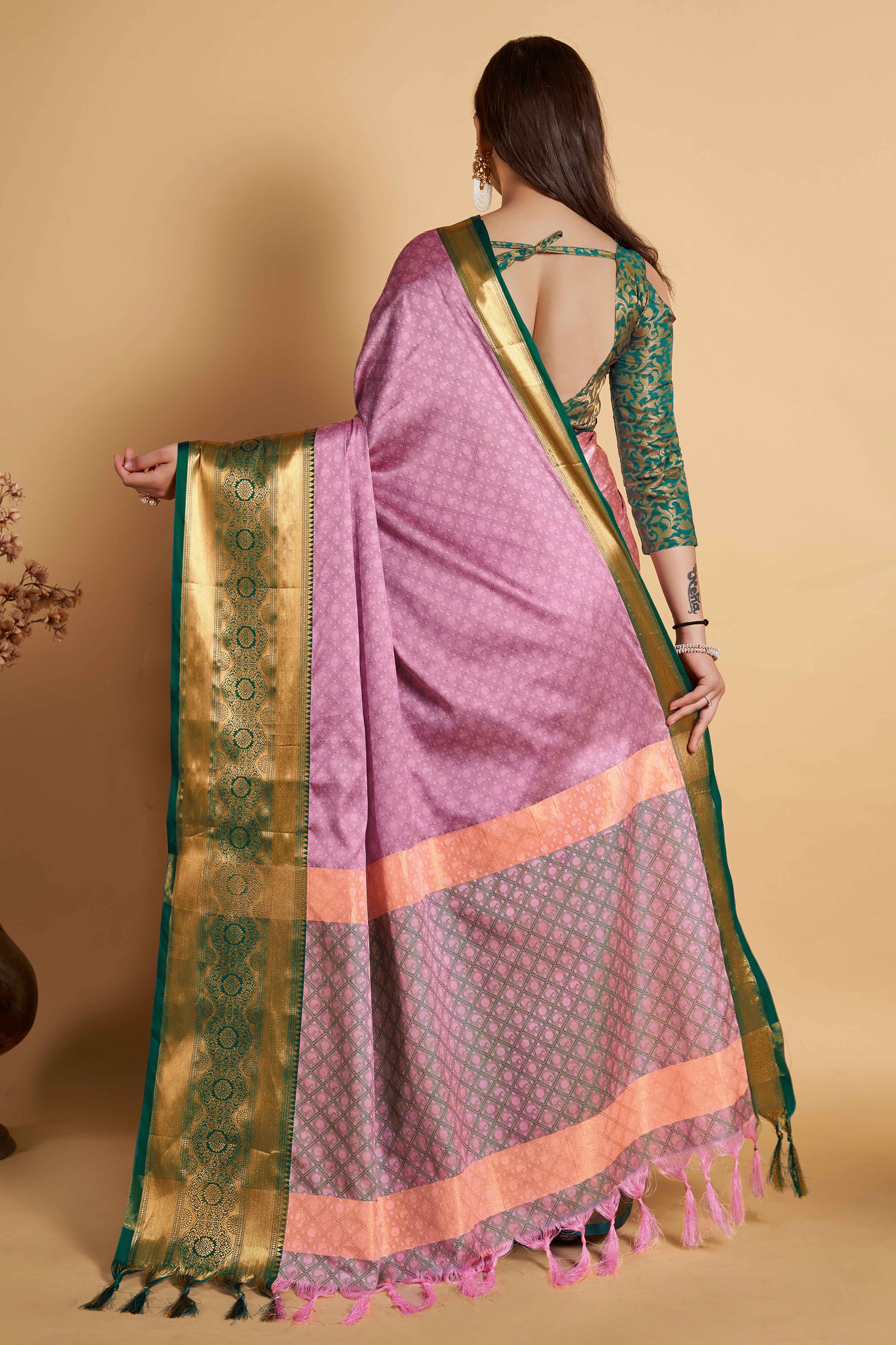 Pink Silk Blend Saree With Exquisite Zari Weaving & Graceful Tassels