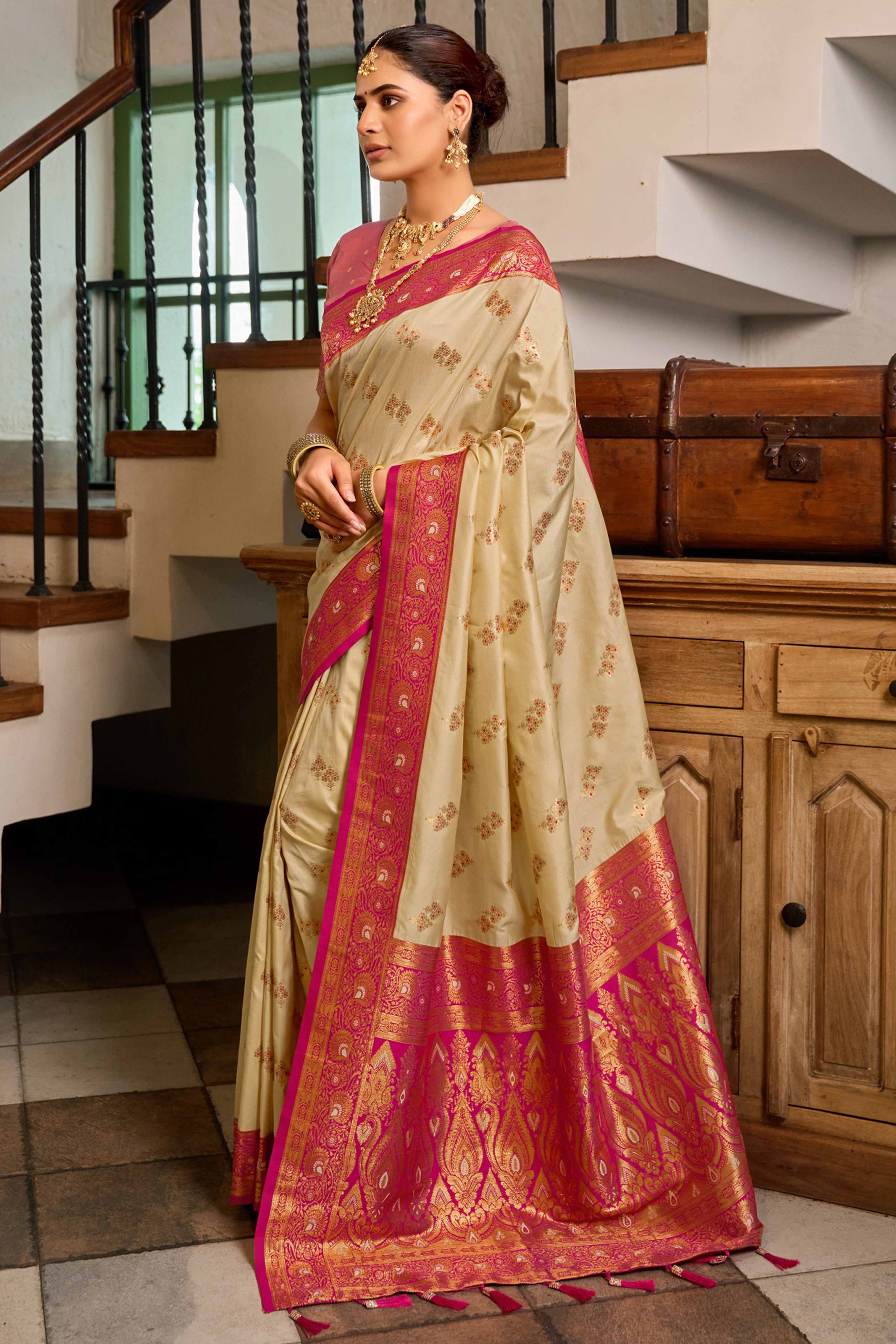 Cream Silk Blend Saree Featuring Intricate Floral Zari Work