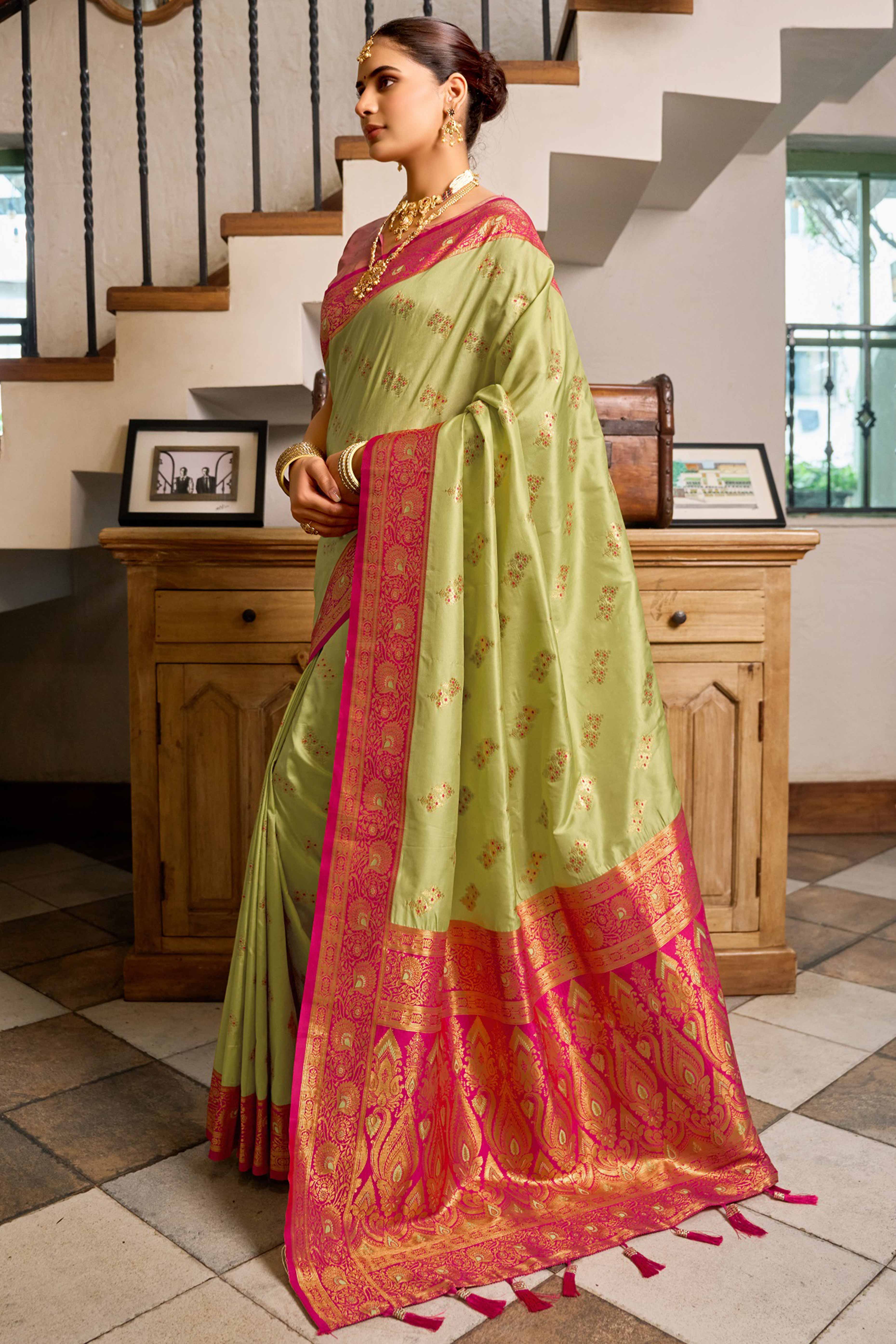 Pista Green Silk Blend Saree Featuring Intricate Floral Zari Work