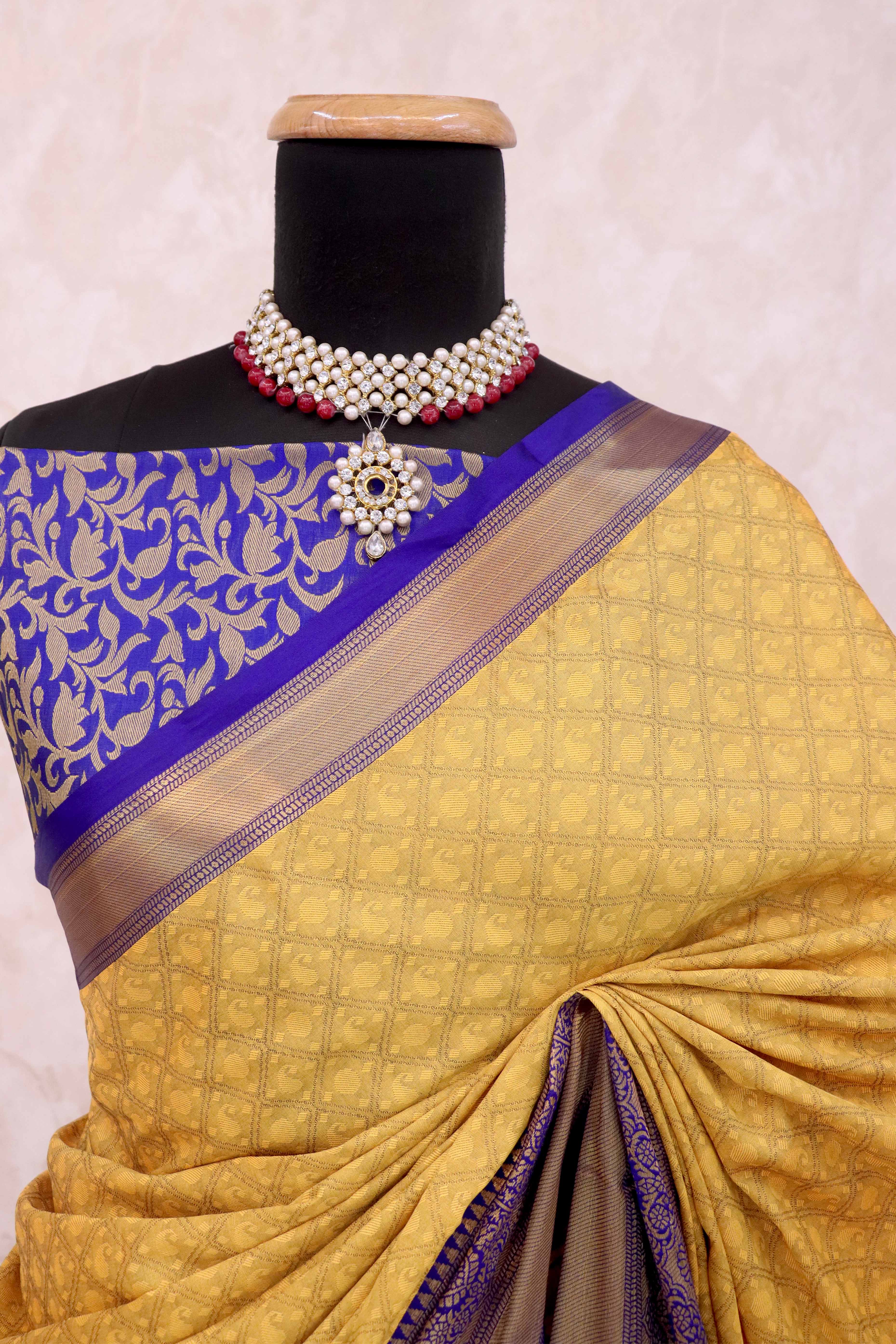 Mustard Silk Blend Saree With Detailed Zari Weaving & Tassel Embellishments