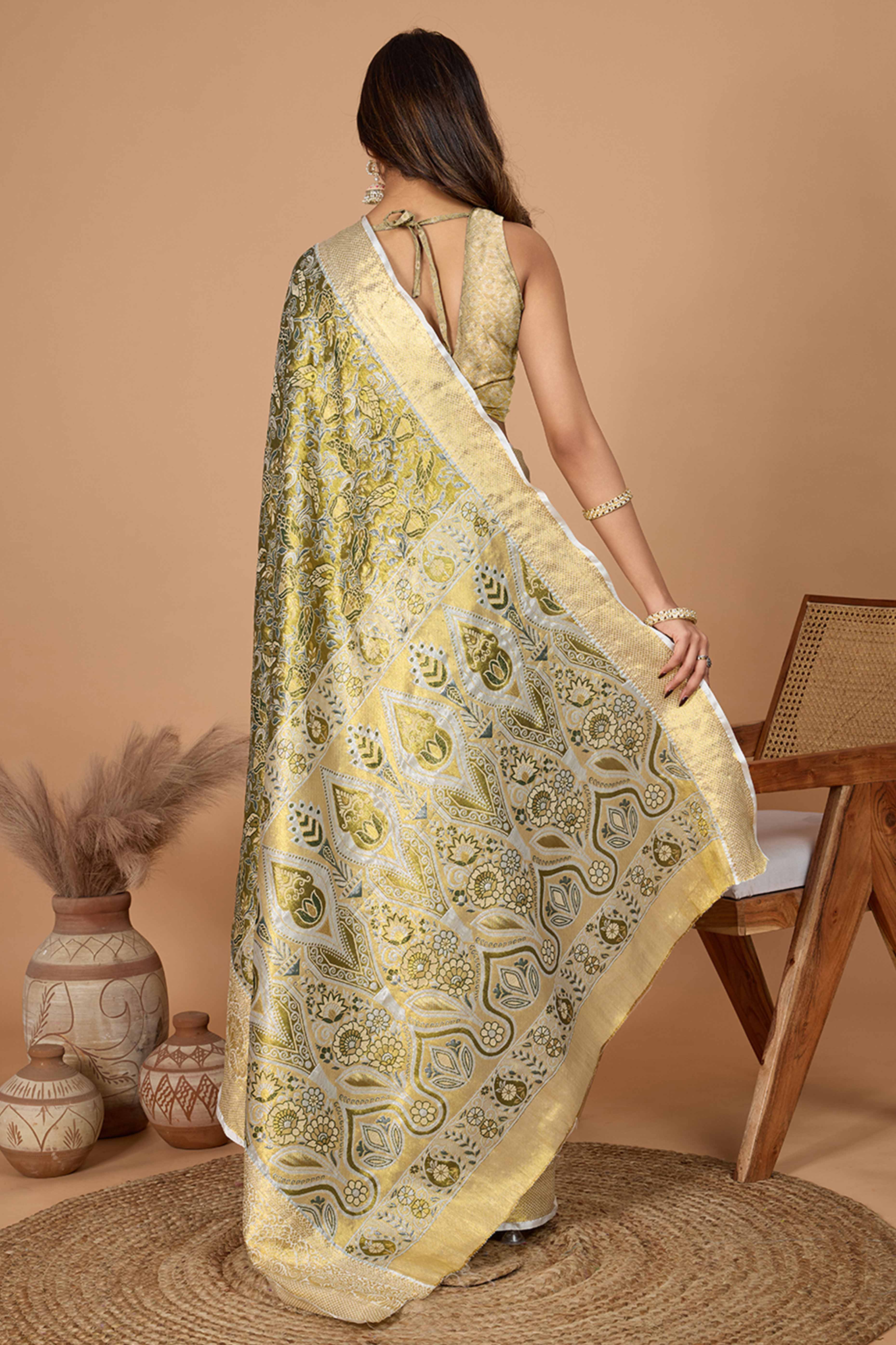 Mahendi Green Kanjivaram Silk Saree Adorned With Exquisite Floral Zari Weaving