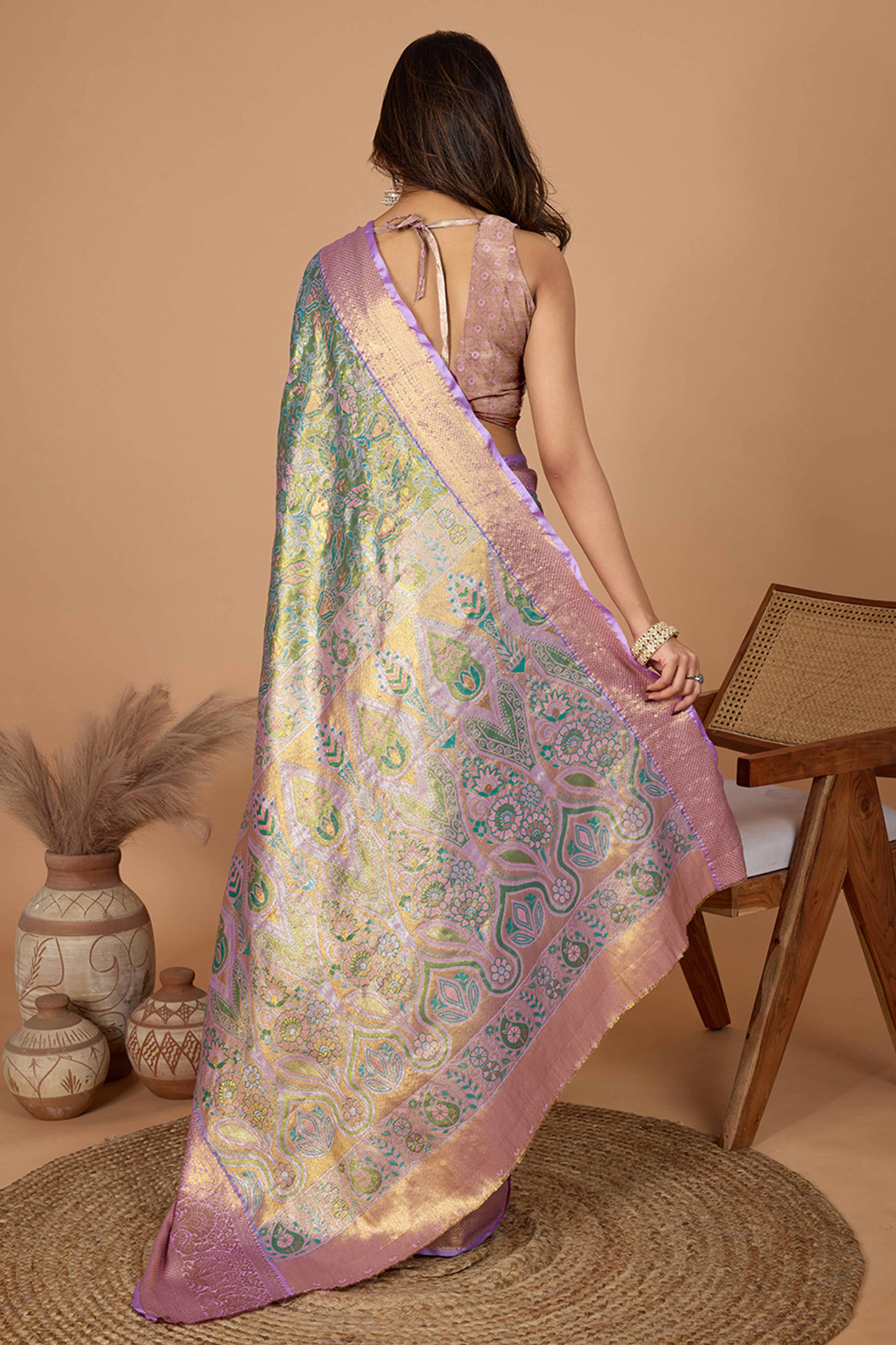 Pista Green Kanjivaram Silk Saree Adorned With Exquisite Floral Zari Weaving