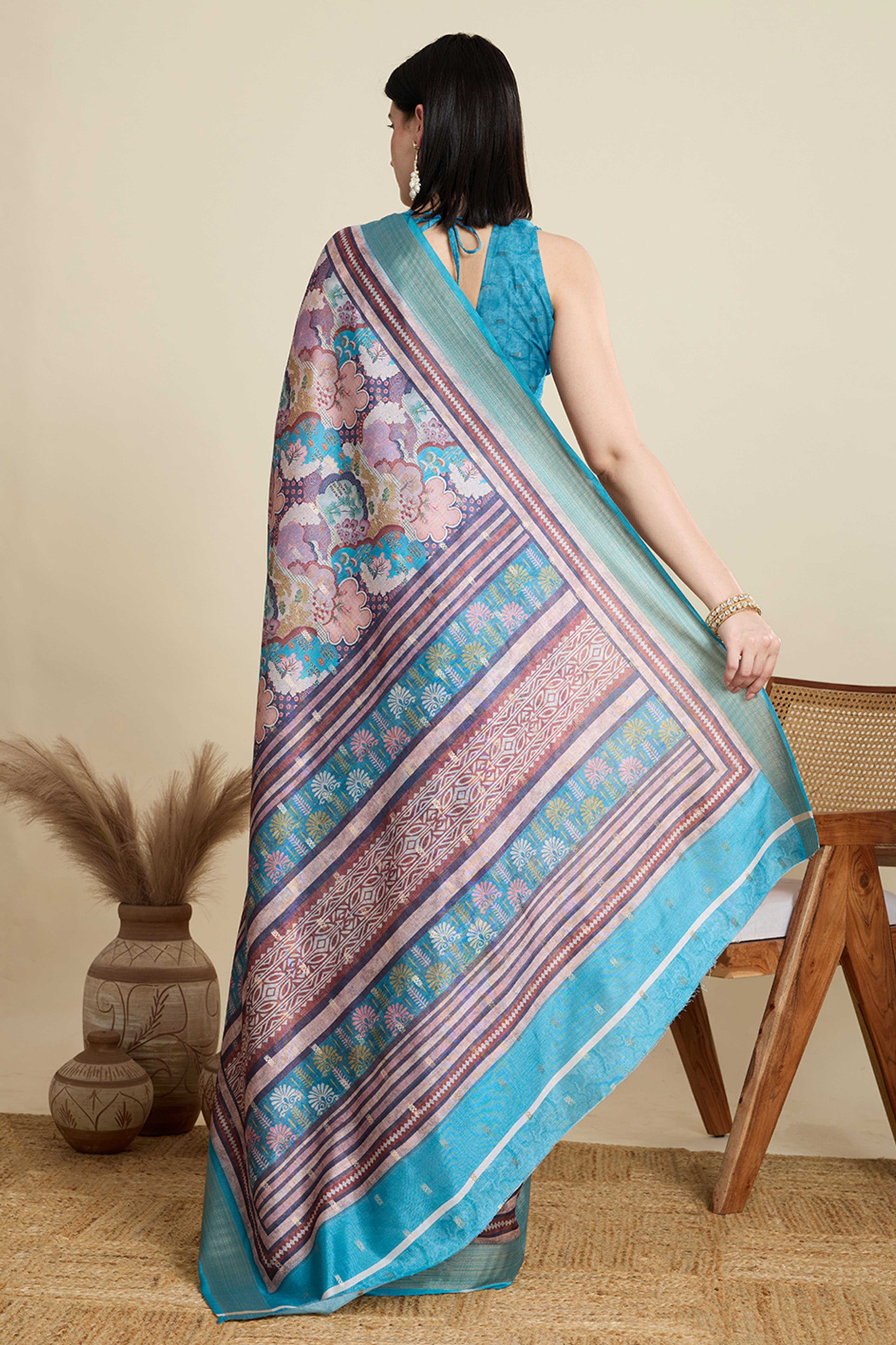 Multicolor Cotton Blend Saree Featuring Floral Prints and a Festive Zari Border Accent