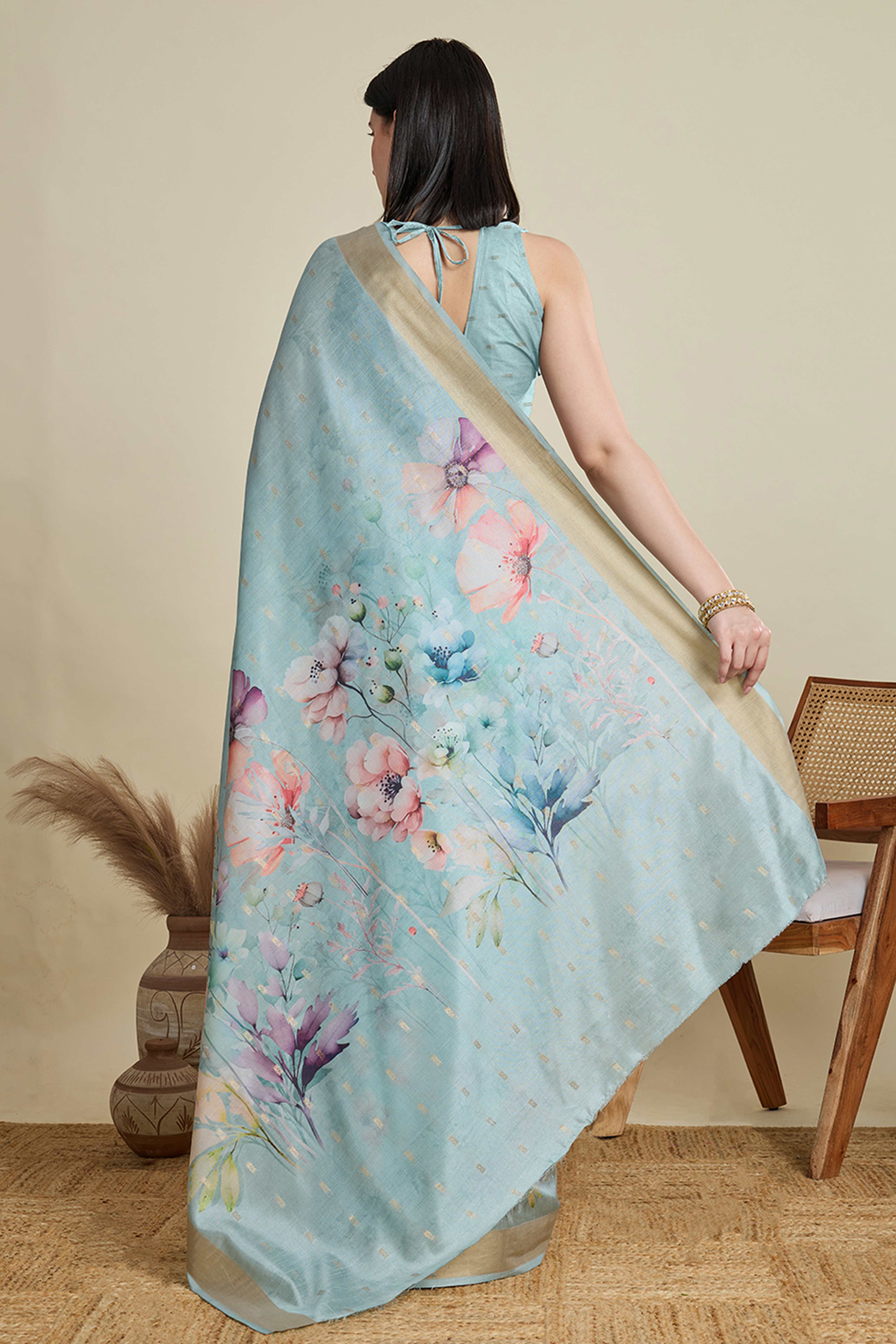 Sky Blue Cotton Blend Saree Featuring Floral Prints and a Festive Zari Border Accent