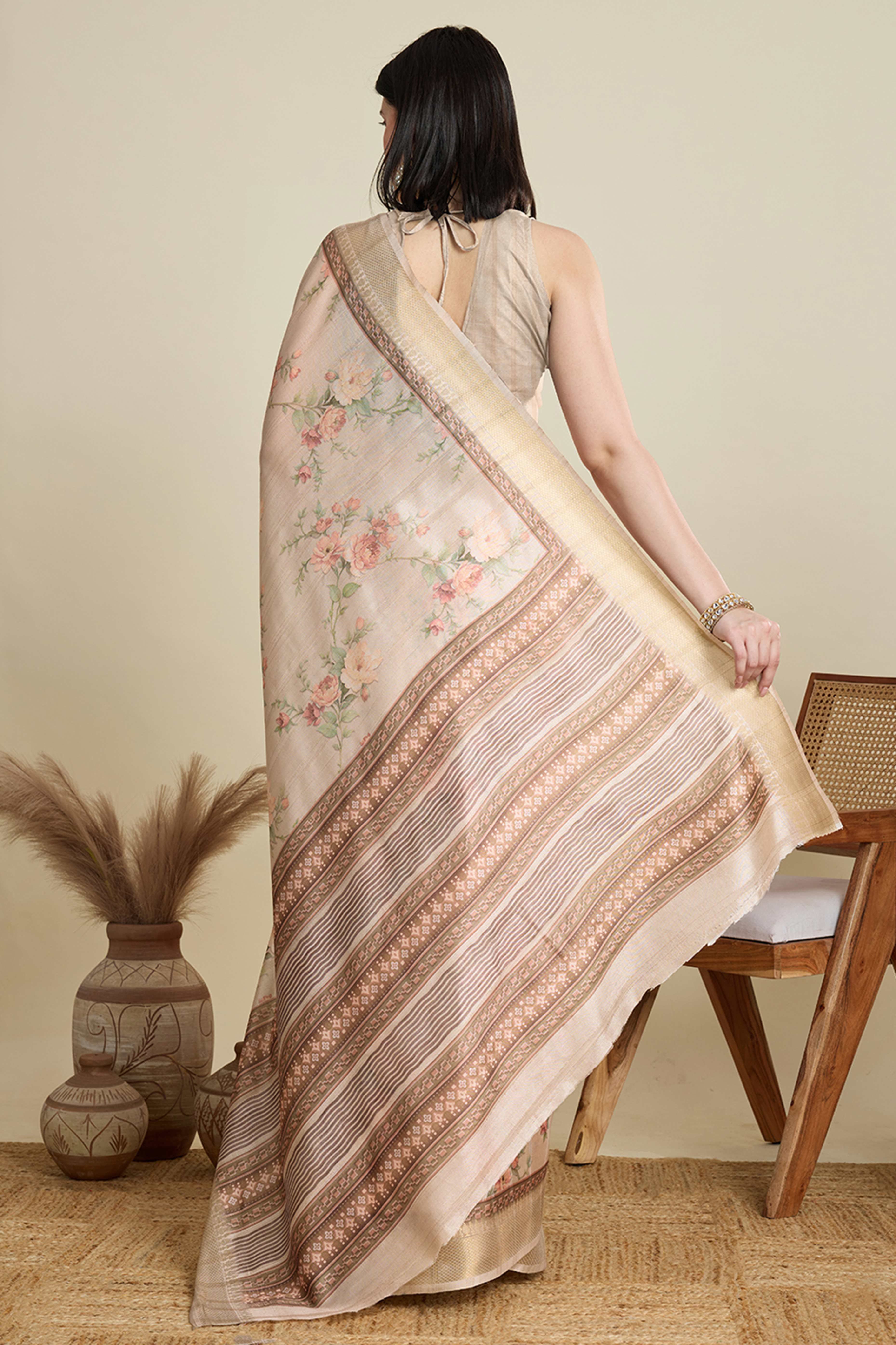 Cream Cotton Blend Saree Featuring Floral Prints and a Festive Zari Border Accent