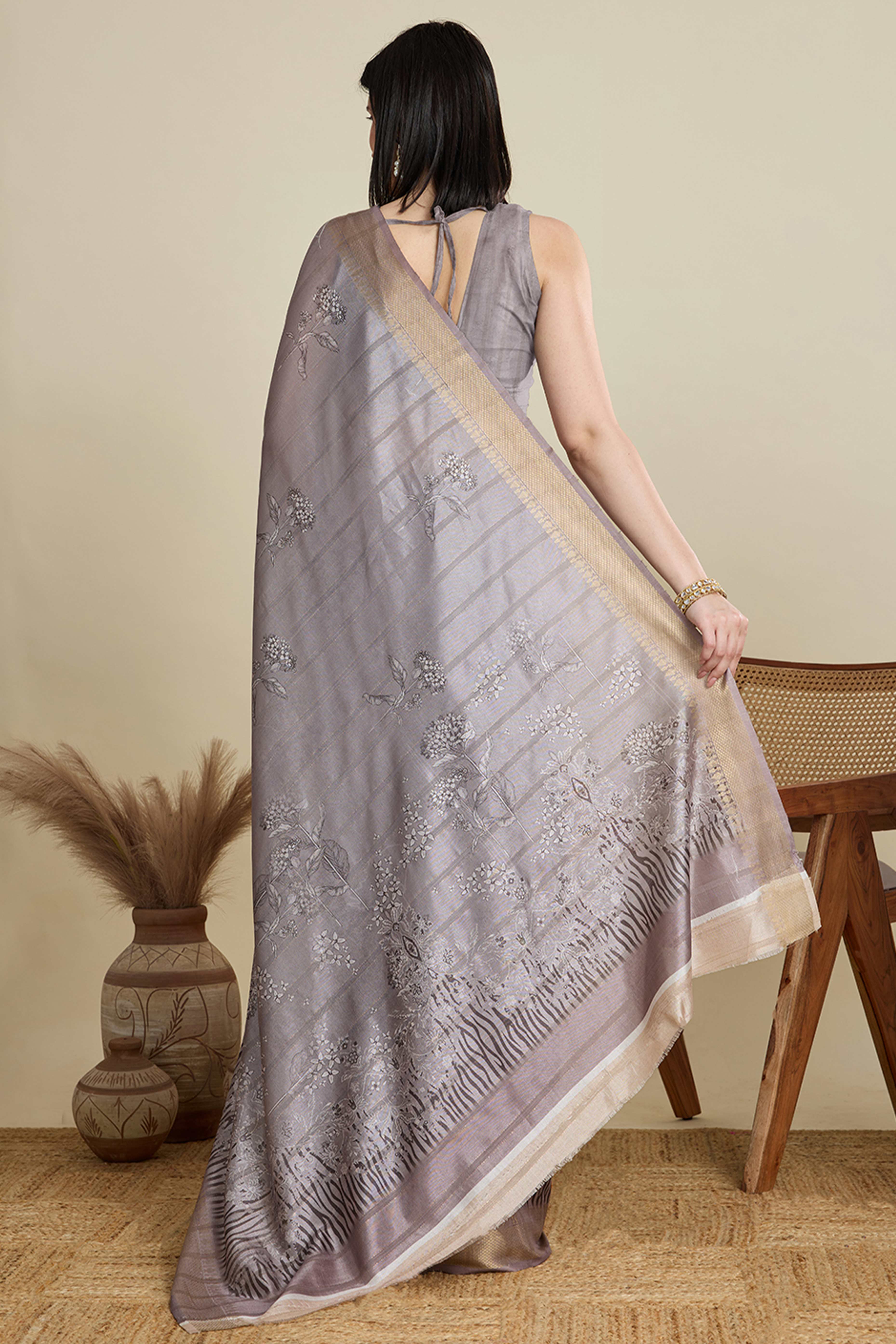 Grey Cotton Blend Saree Featuring Floral Prints and a Festive Zari Border Accent