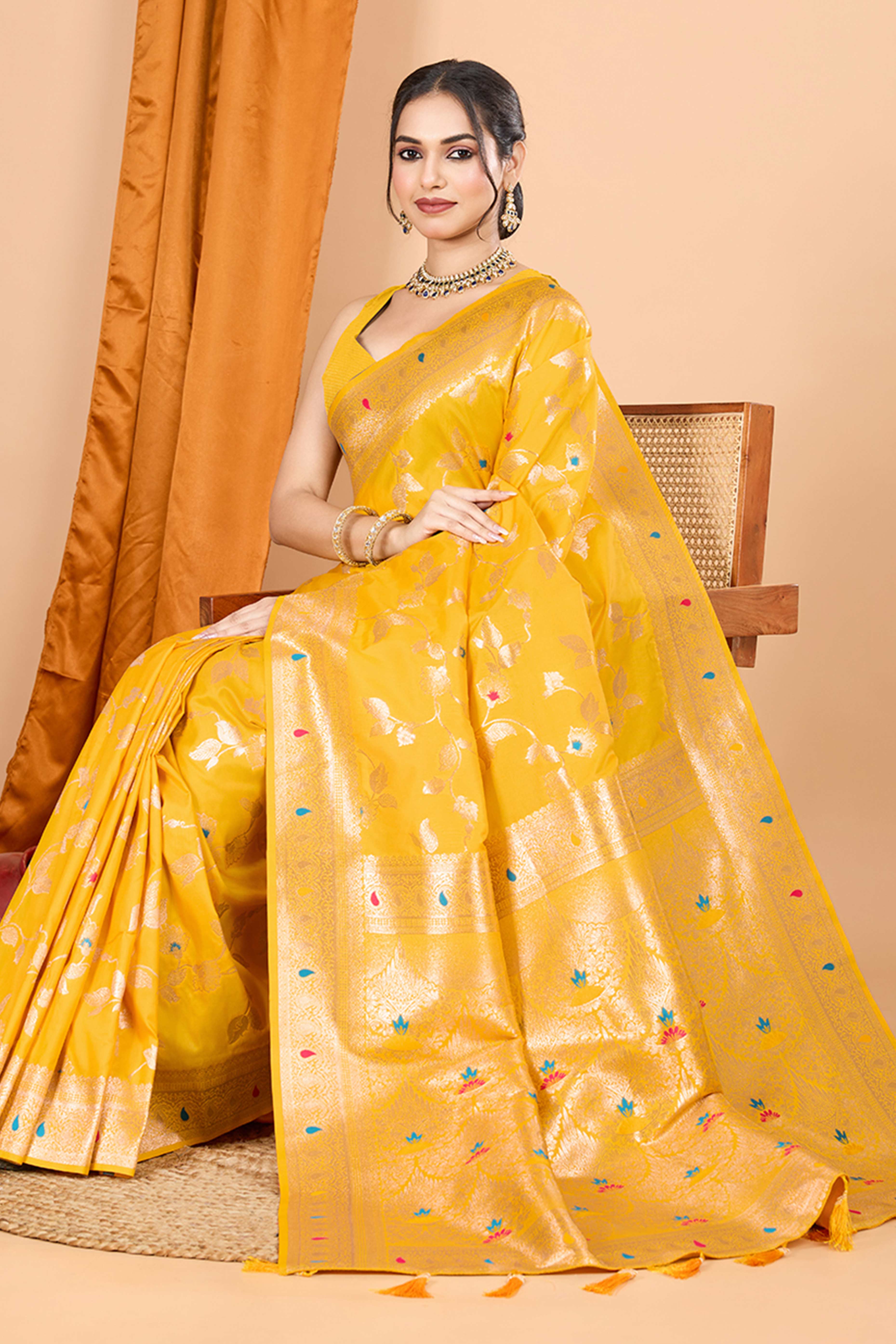 Yellow Banarasi Silk Saree With Exquisite Floral Zari Weaving and Elegant Tassels