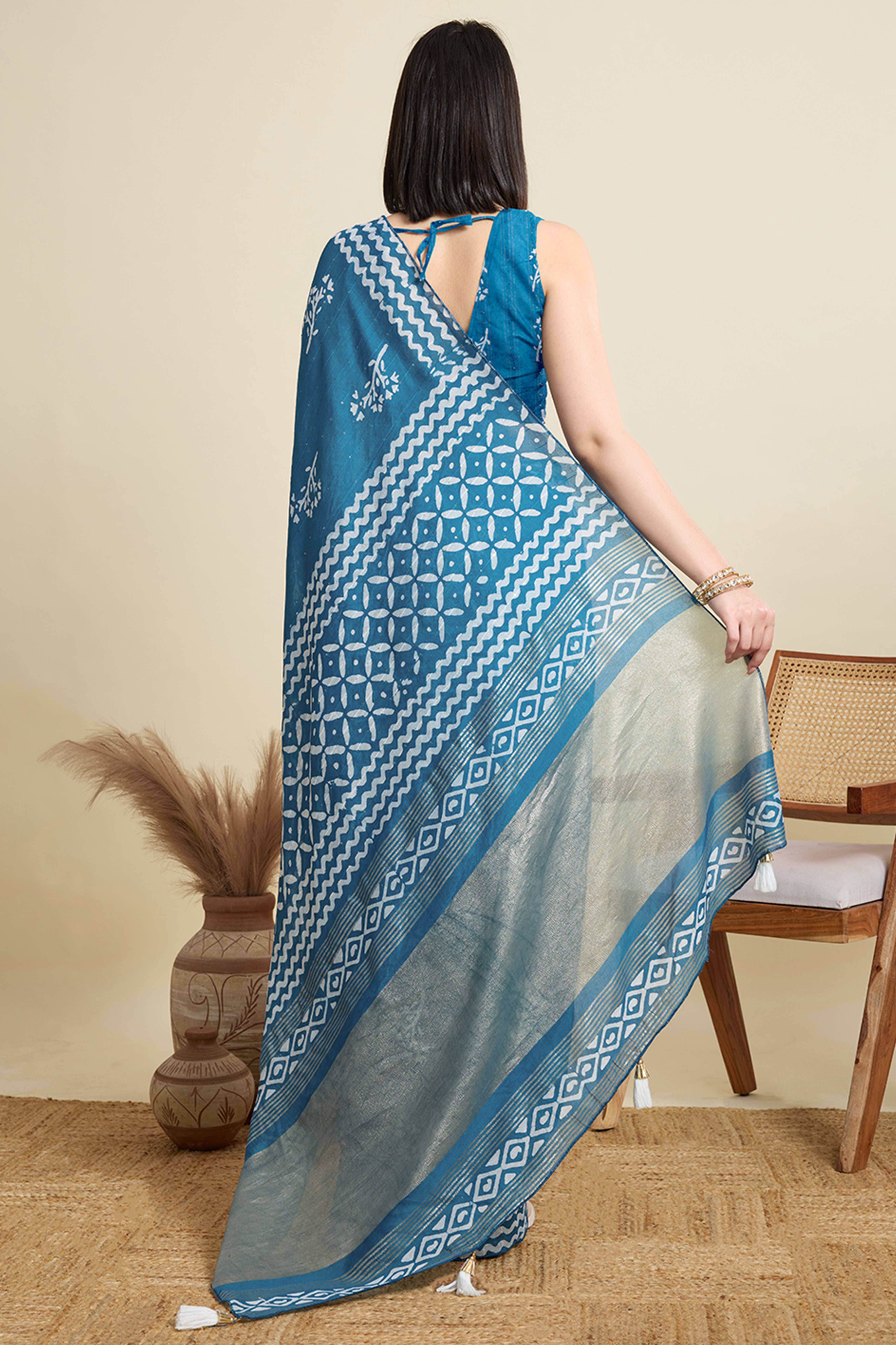 Blue Cotton Blend Saree Featuring Floral Prints and Elegant Sequins Work Accents