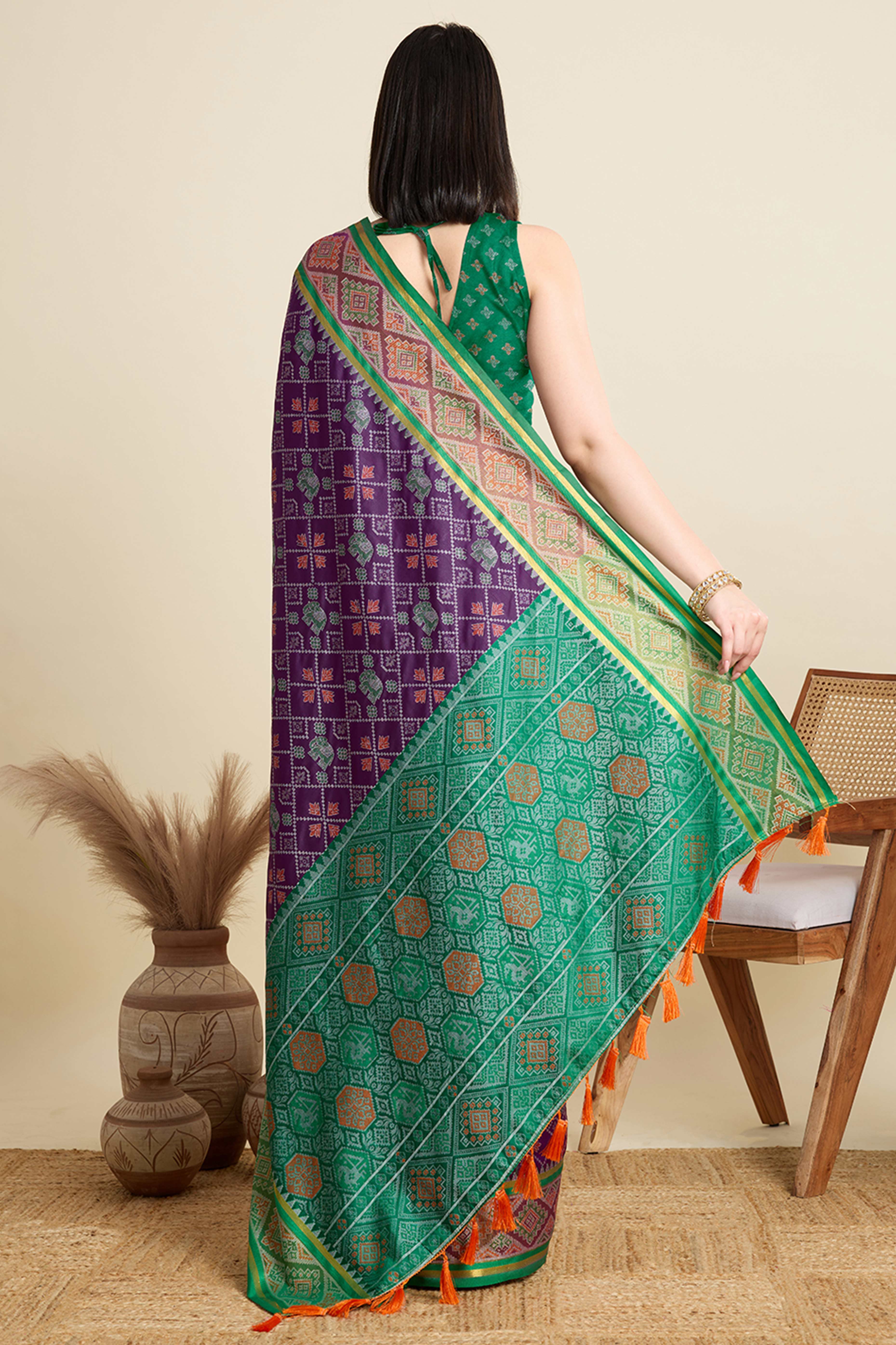 Purple Silk Blend Saree Featuring Patola Prints and a Detailed Weaving Border