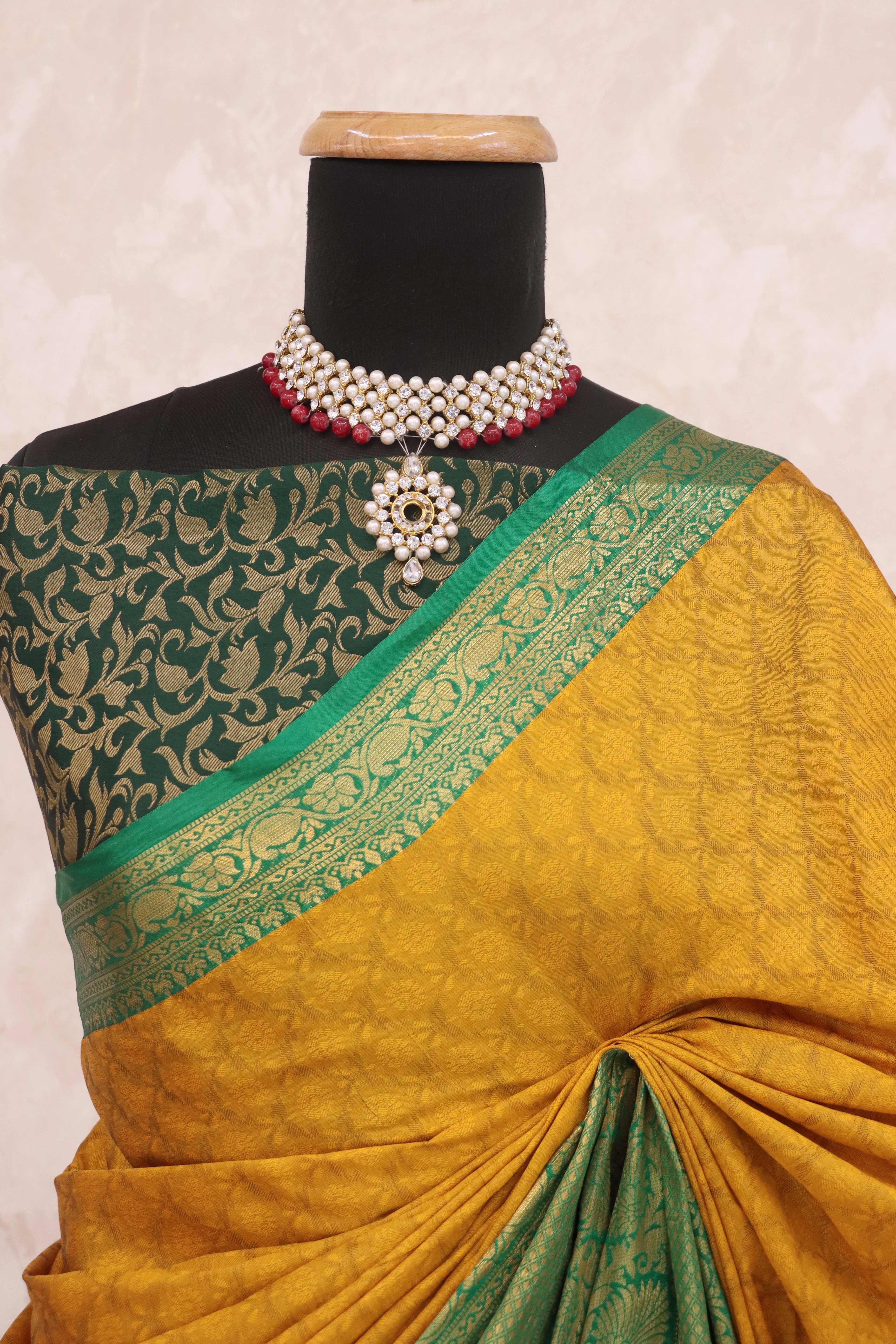 Mustard Silk Blend Saree With Detailed Zari Weaving & Tassel Embellishments