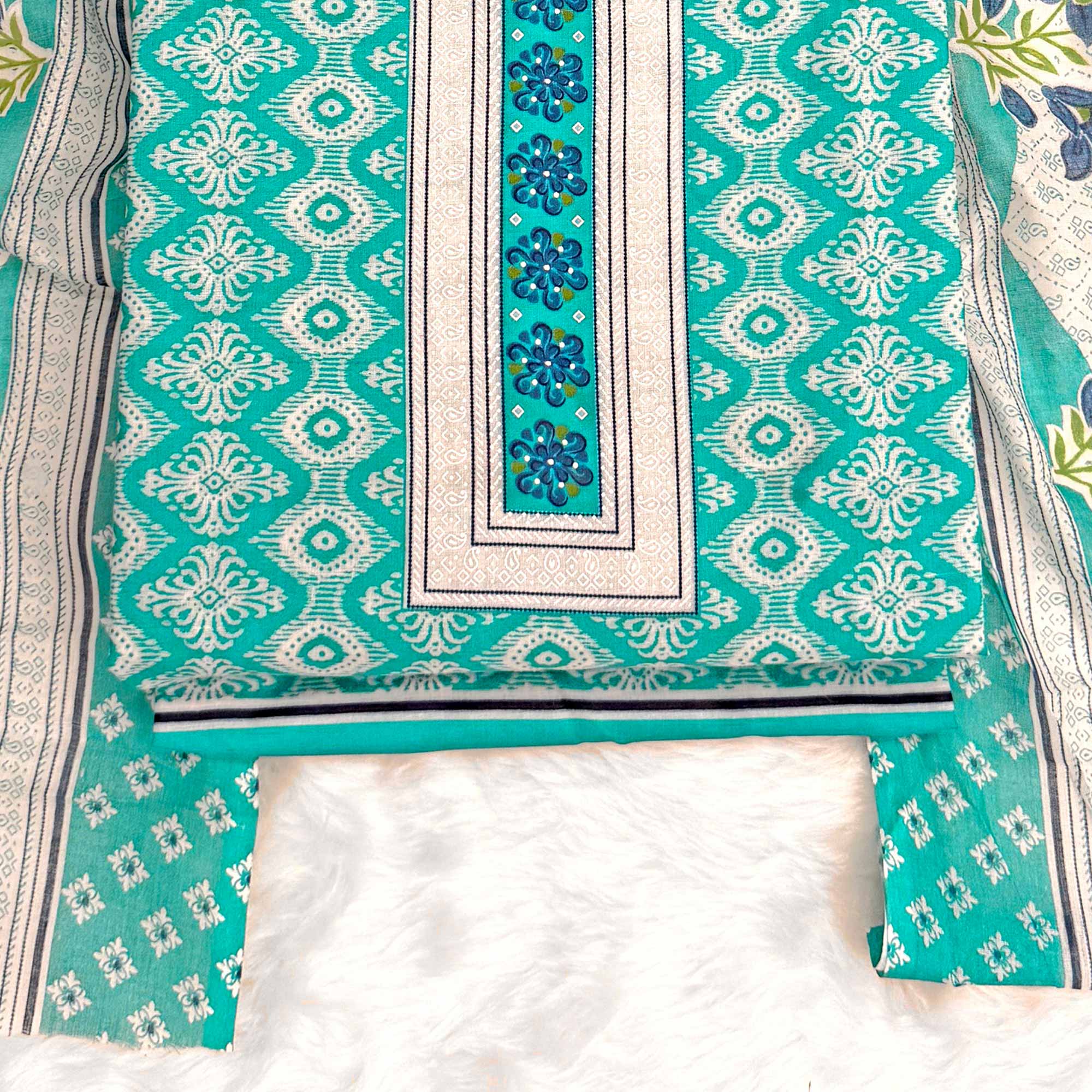 Charming Turquoise Pure Cotton Dress Material With Delicate Floral Print