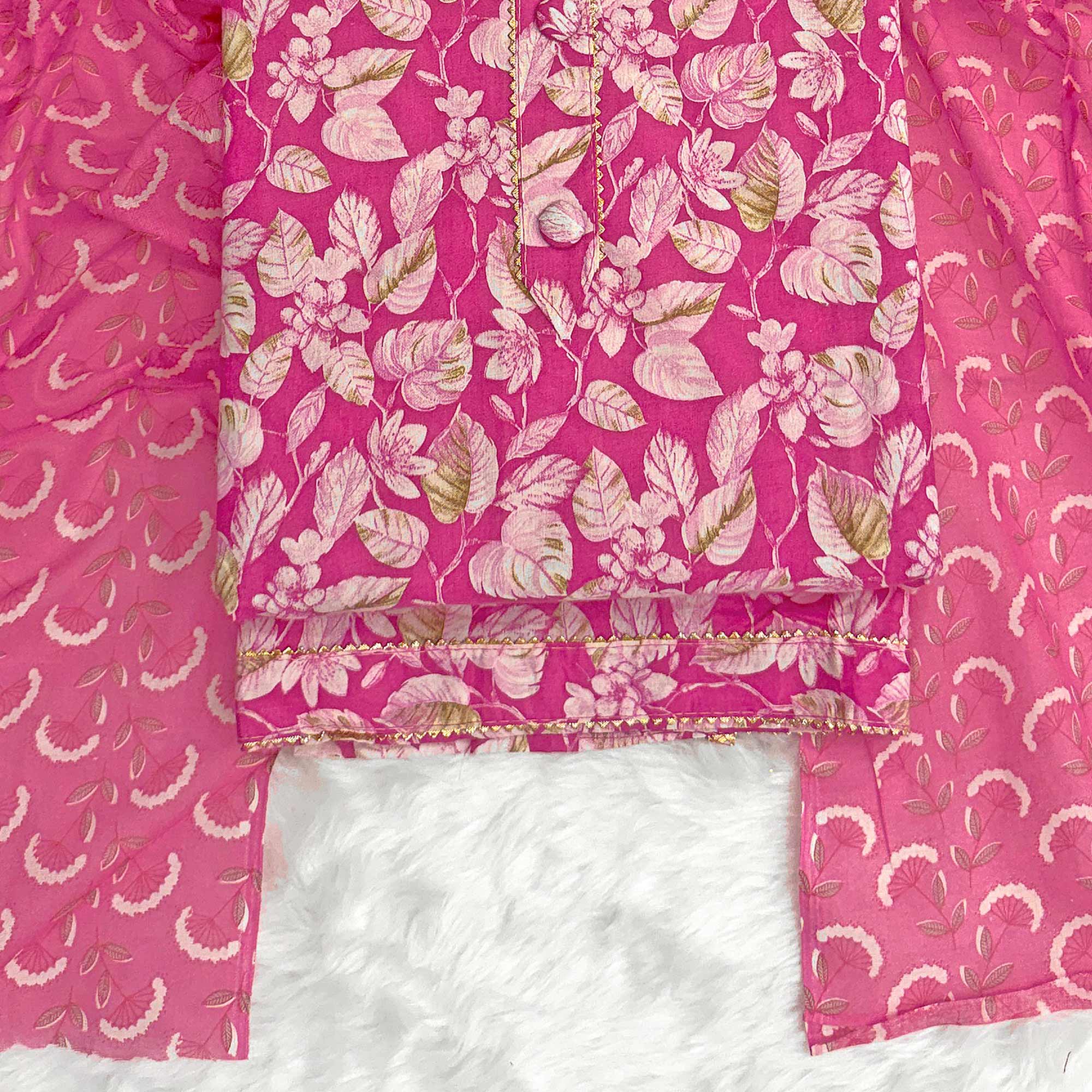 Charming Magenta Pure Cotton Dress Material Featuring Floral Print With Tie On Neck & Fancy Button