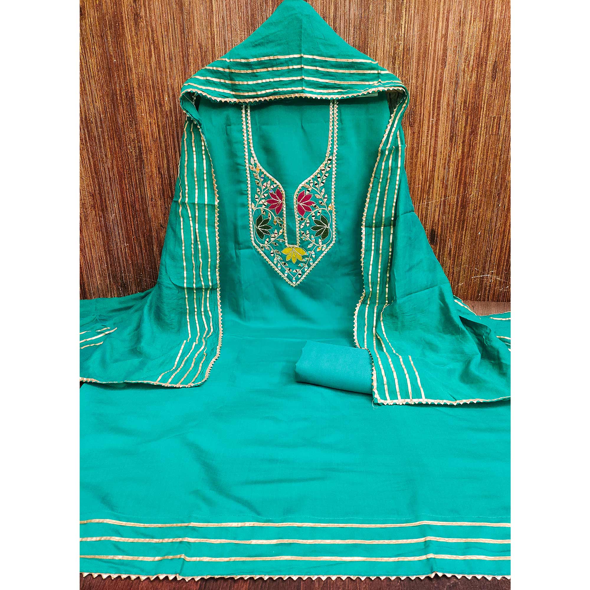 Rama Green Floral Embroidery Chanderi Cotton Dress Material Embellished With Mirror & Gota Patti