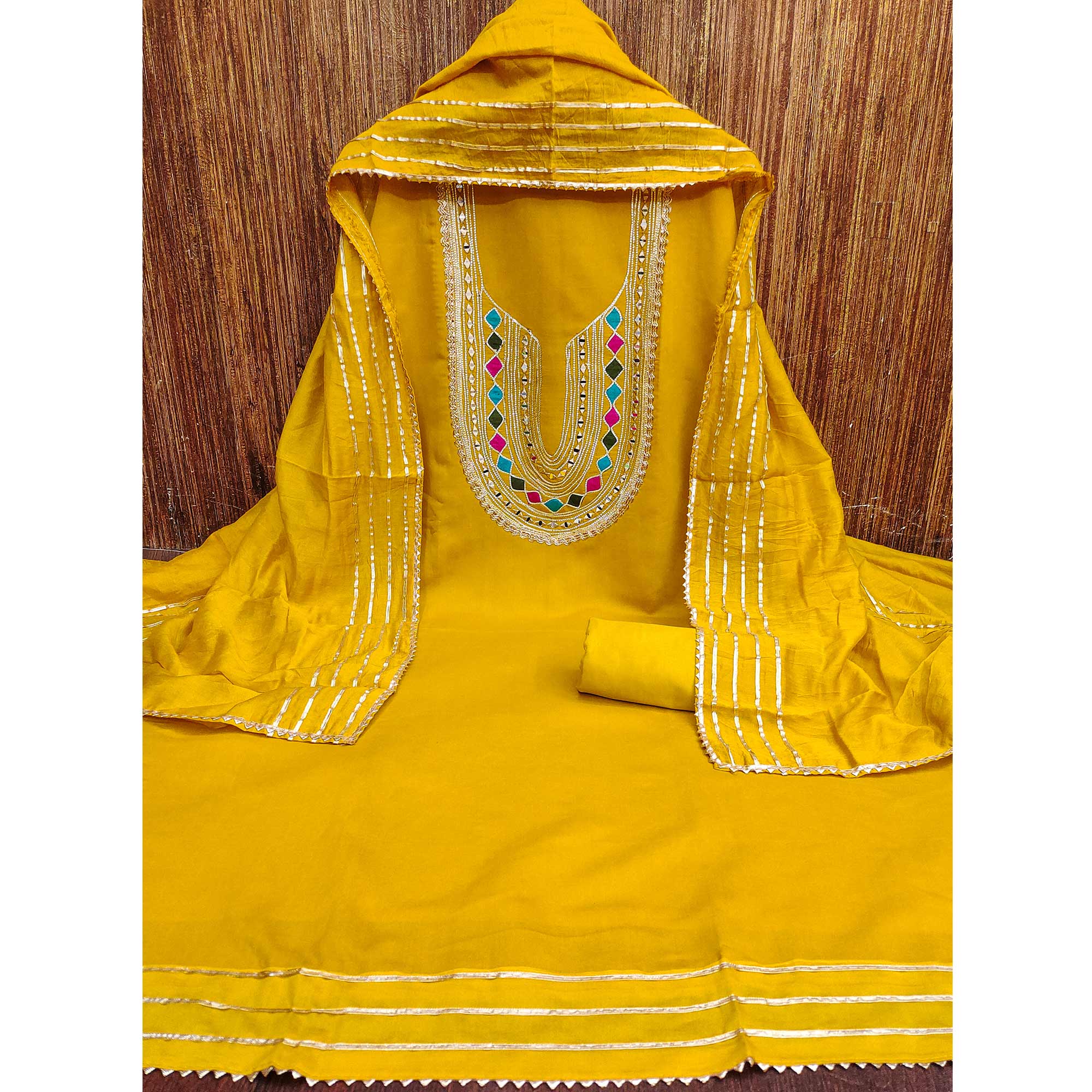 Mustard Embroidered Chanderi Cotton Dress Material With Reflective Mirror & Gota Patti Work