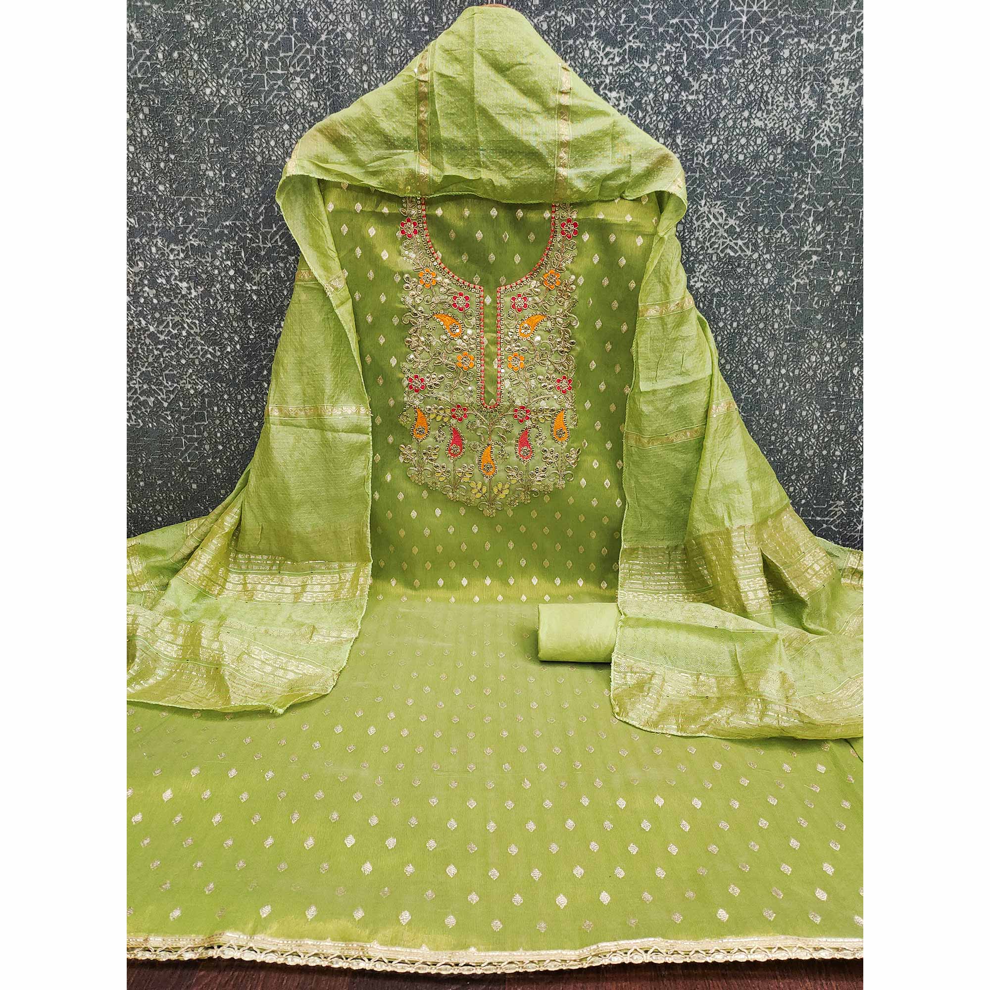 Green Woven Shimmer Dress Material Featuring Sequins Embroidery & Gota Patti Accents