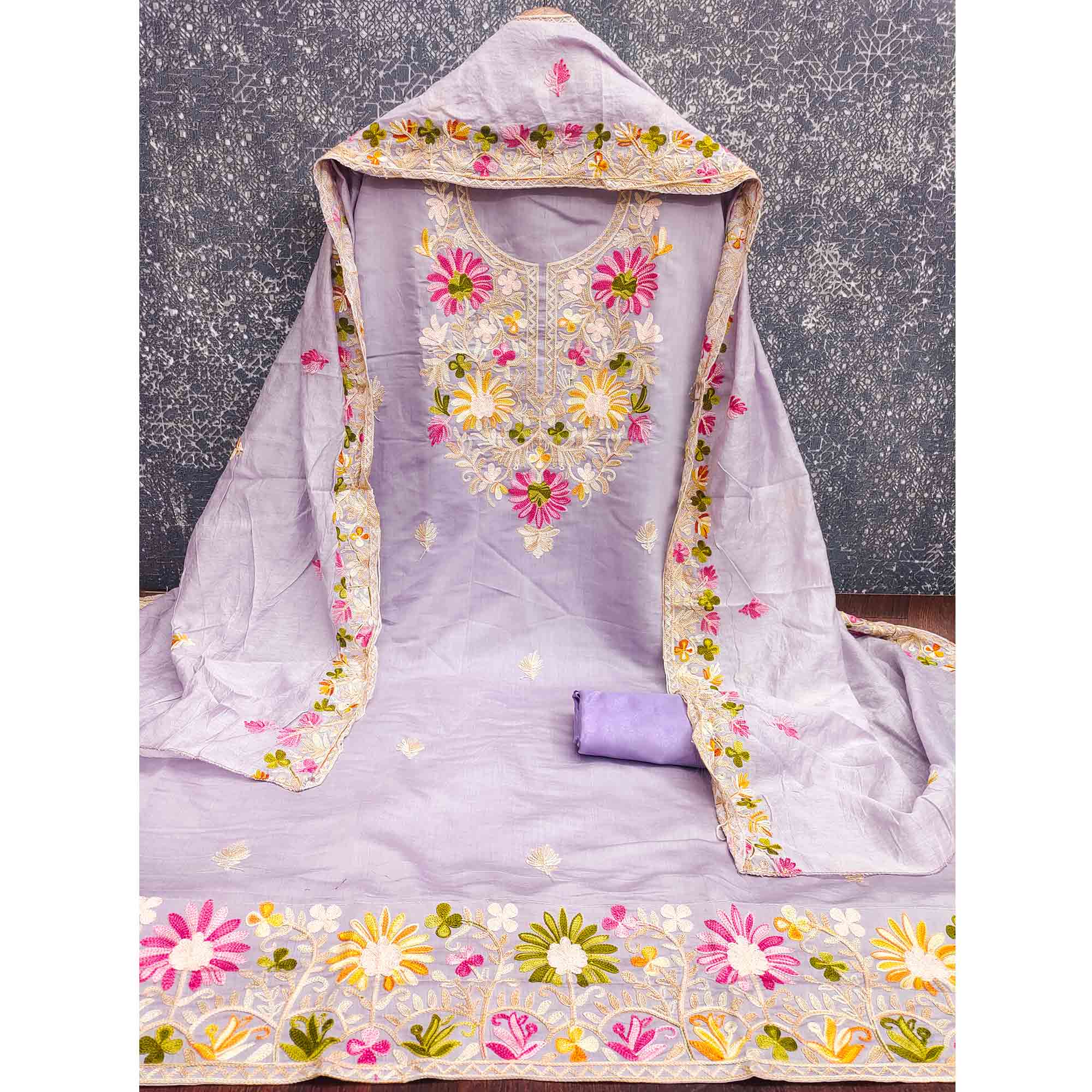 Lavender Designer Roman Art Silk Dress Material Adorned With Floral Thread Embroidery Work