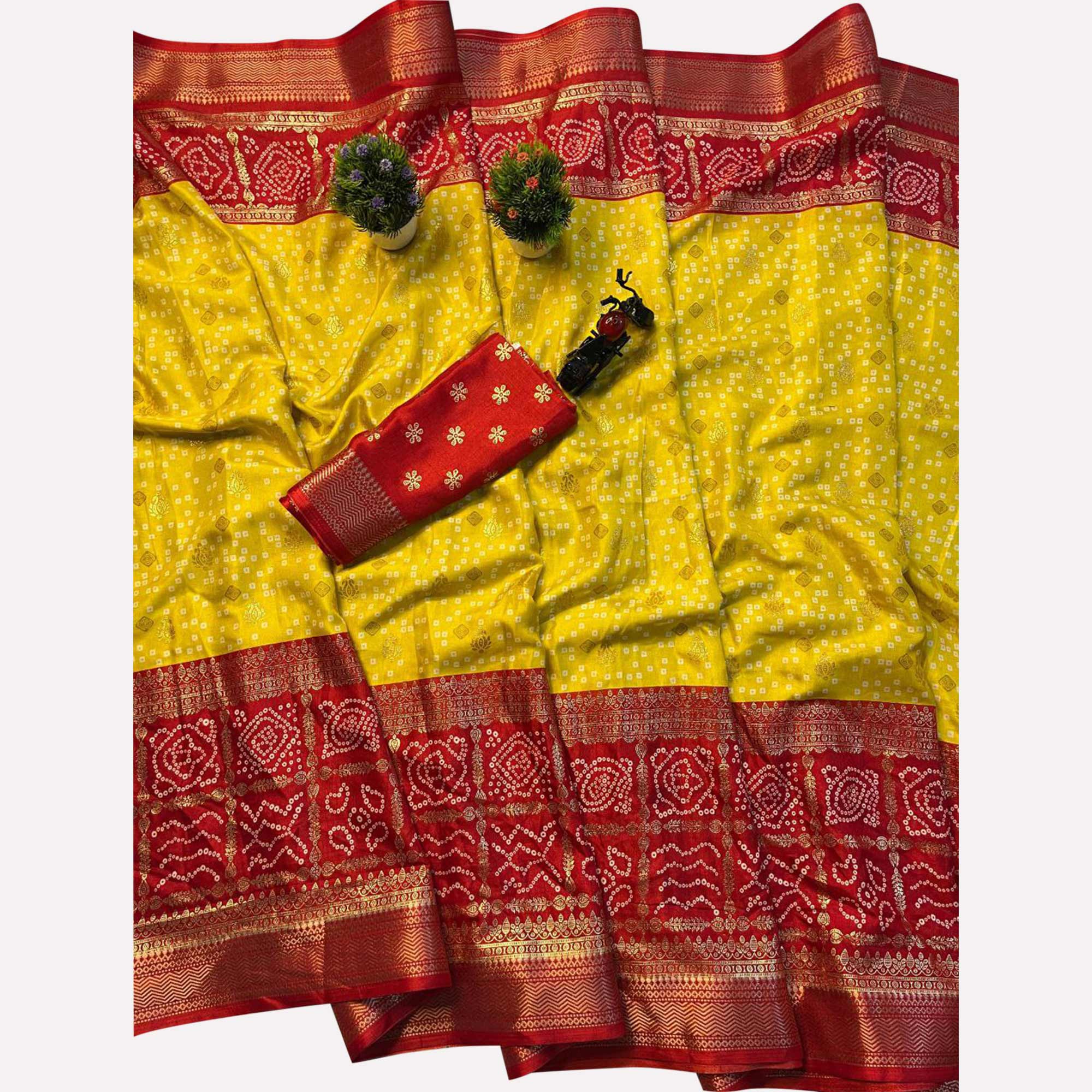 Yellow & Red Dola Silk Saree Featuring Traditional Bandhani Print & Woven Border